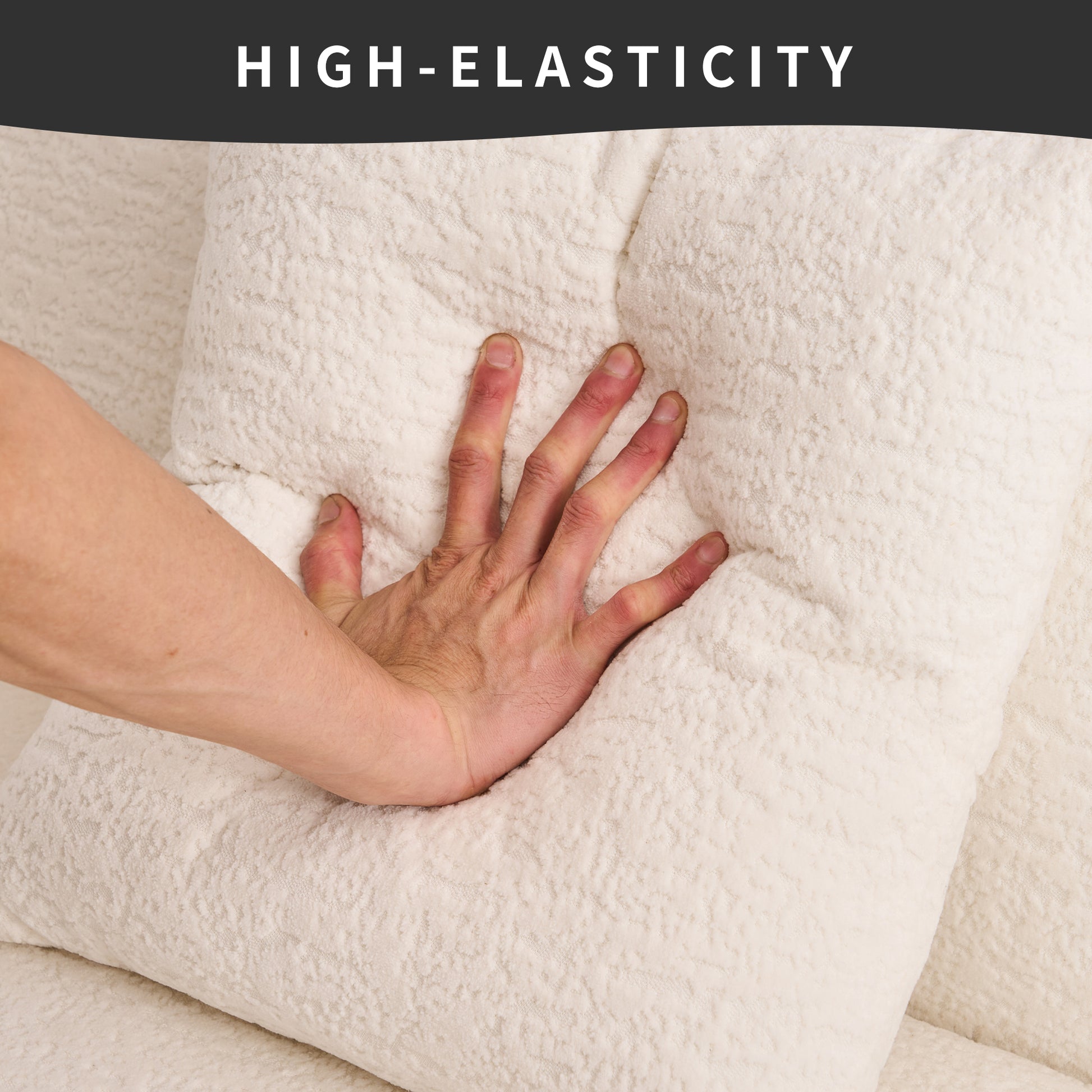 Hand pressing into plush ivory sofa cushion showcasing its high elasticity