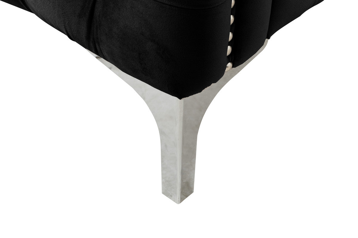 Black velvet tufted ottoman with polished metal legs