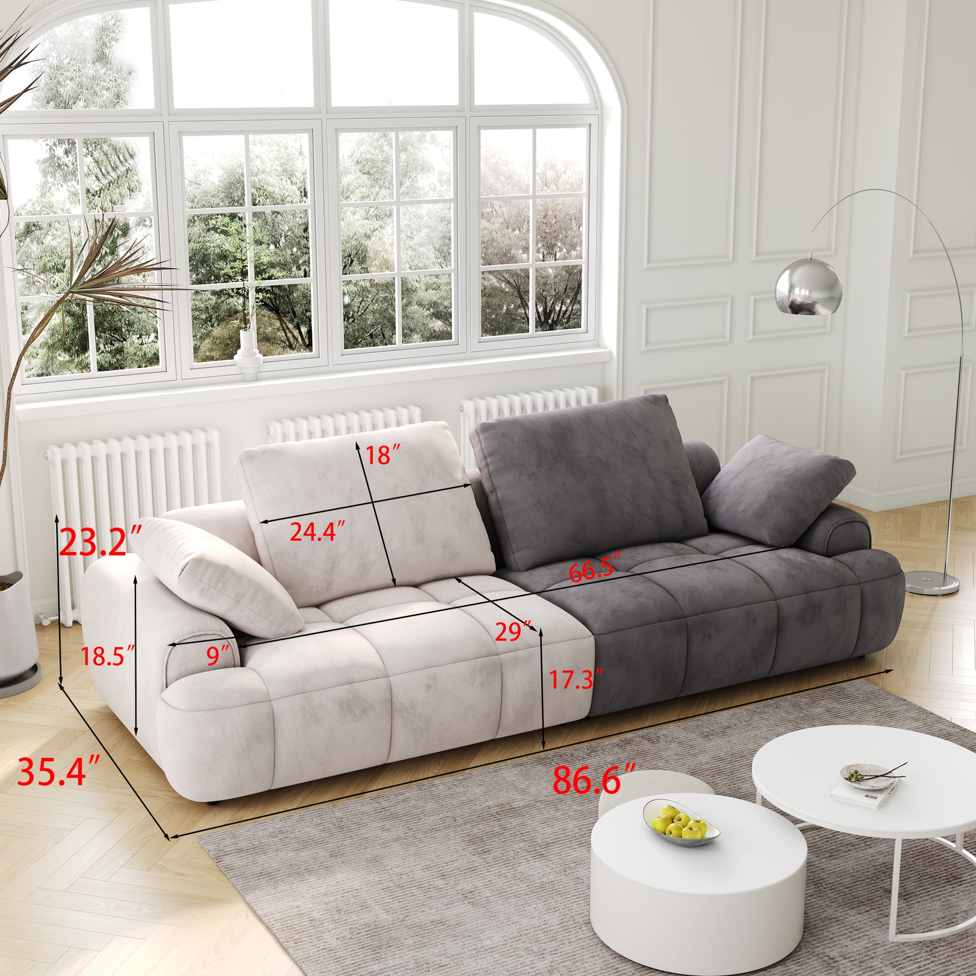 Upholstered sectional sofa with plush cushions in light cream and charcoal grey