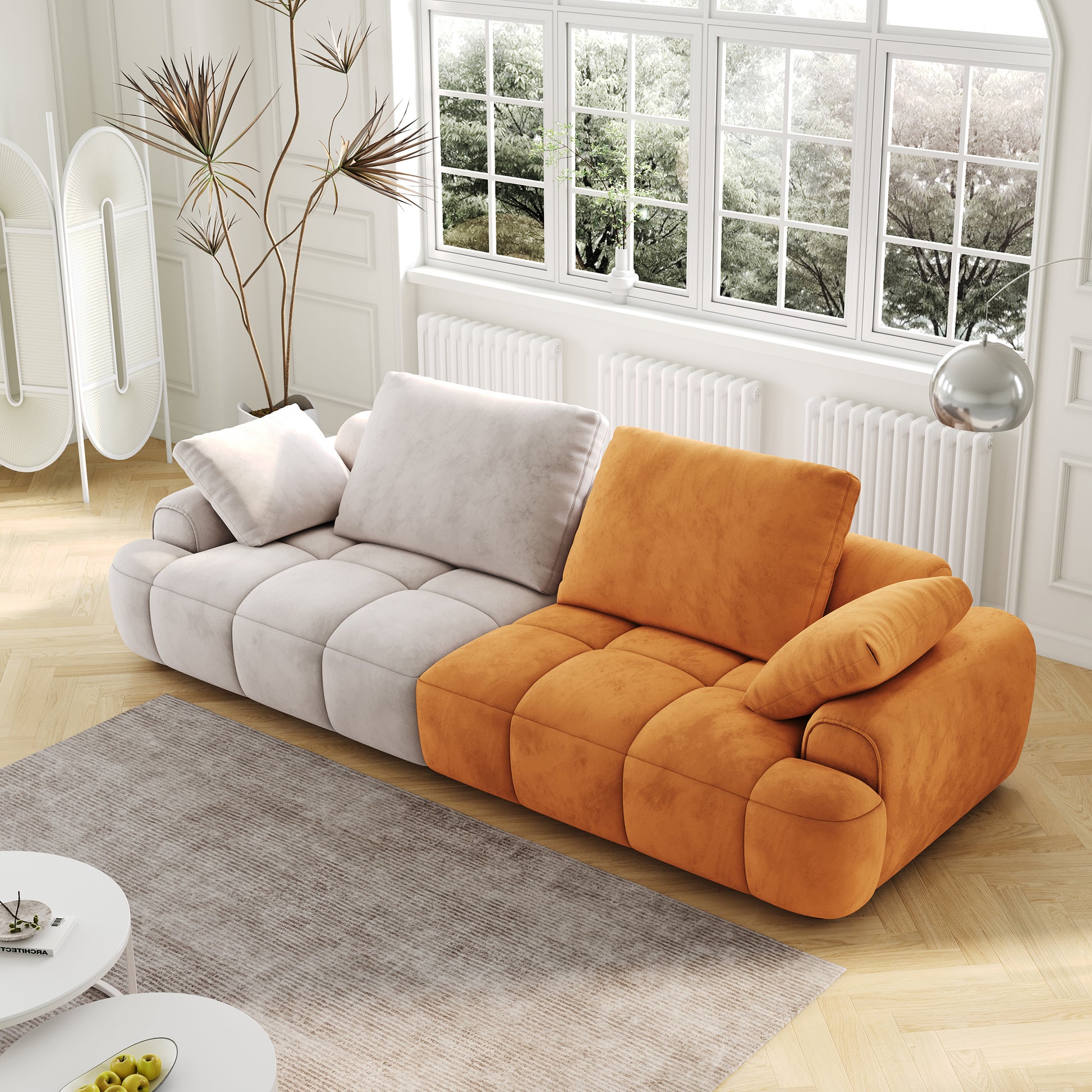Plush modular sofa in contrasting cream and burnt orange upholstery for a modern living room