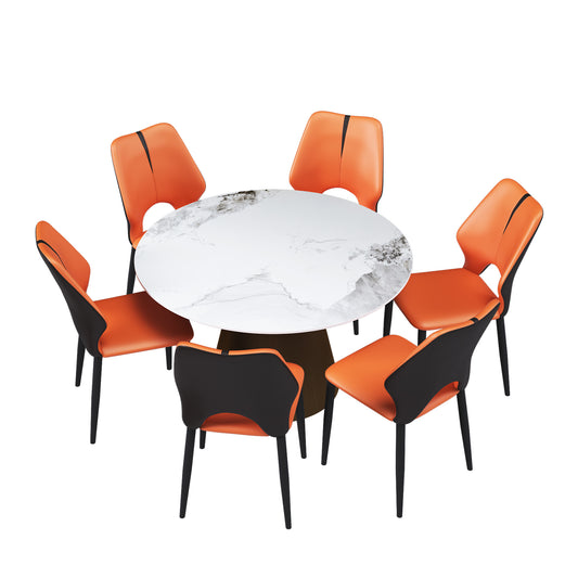 Modern dining set with  orange leather chairs and a white marble round table