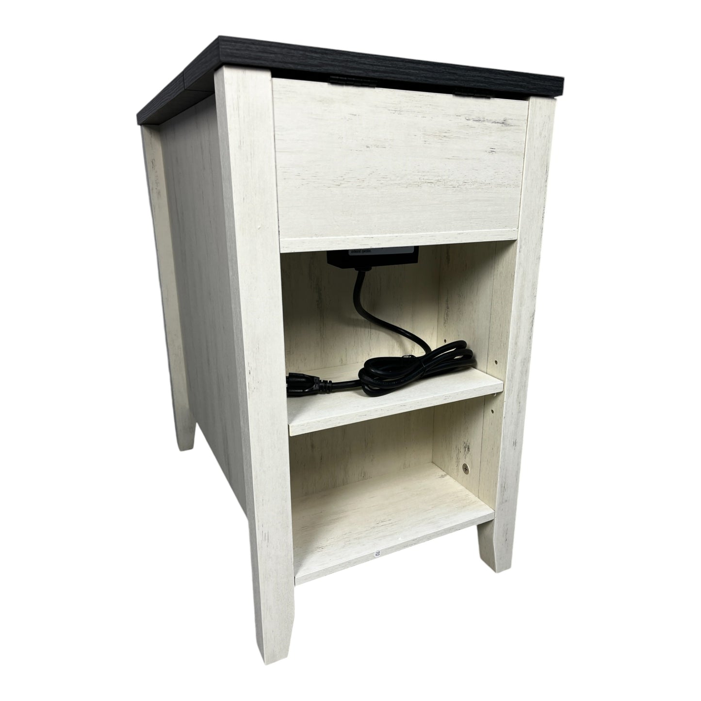 Distressed white wood nightstand with black top and charging station cord