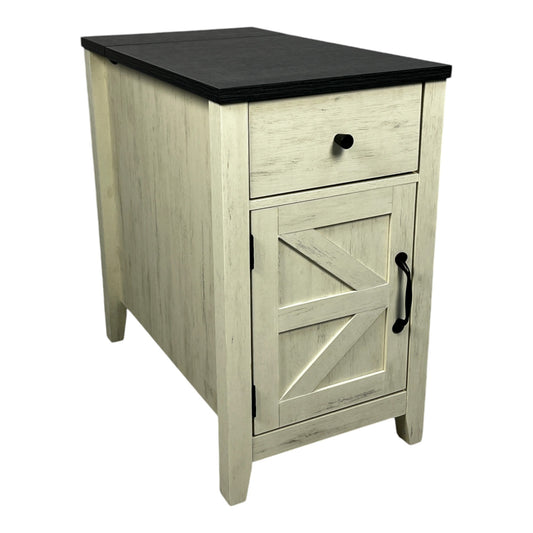 Distressed white farmhouse accent cabinet with black top and barn door style panel