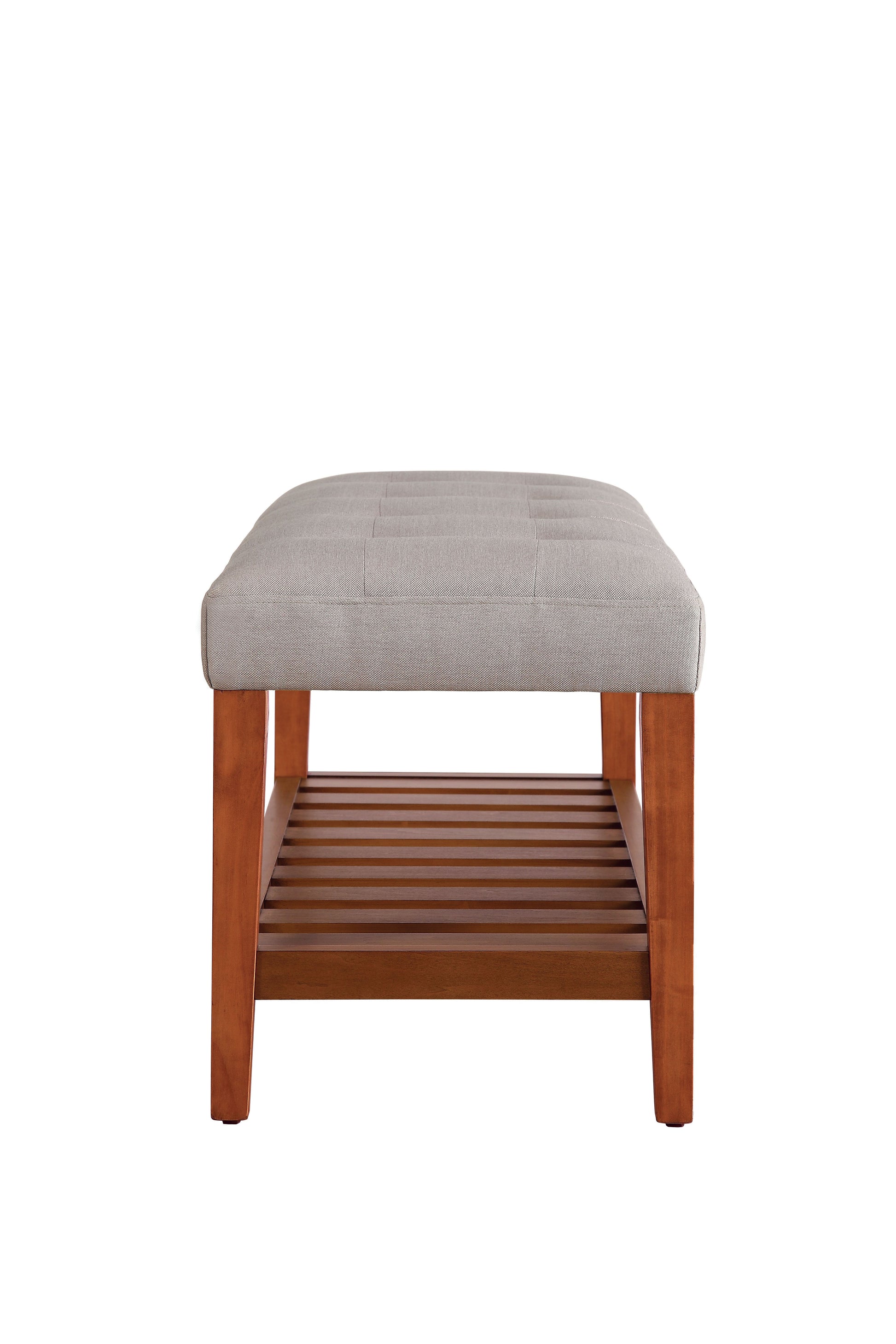 Tufted grey fabric storage bench with slatted wood shelf and cherry wood legs