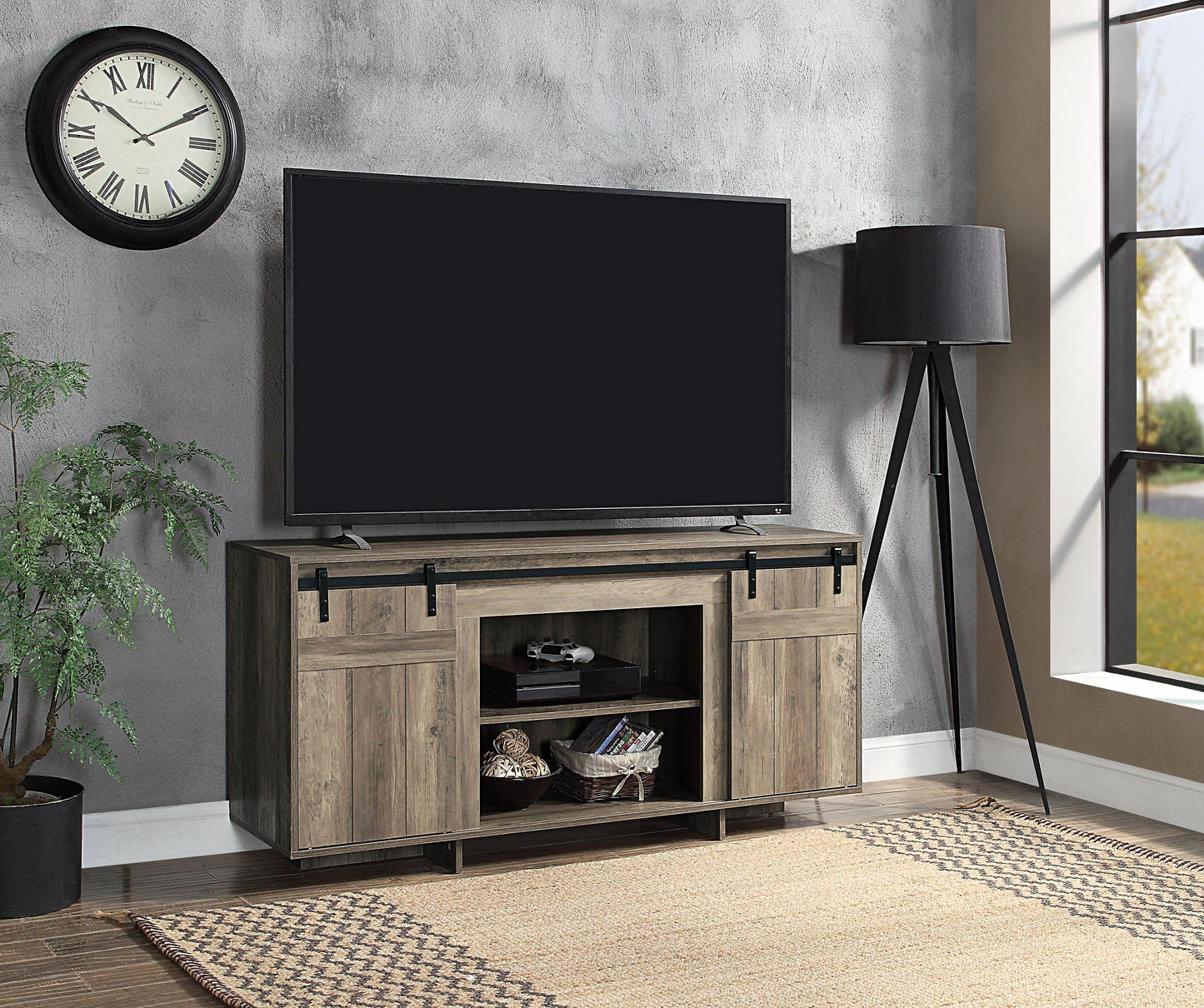 Rustic wood TV stand with sliding barn doors ample storage for media devices