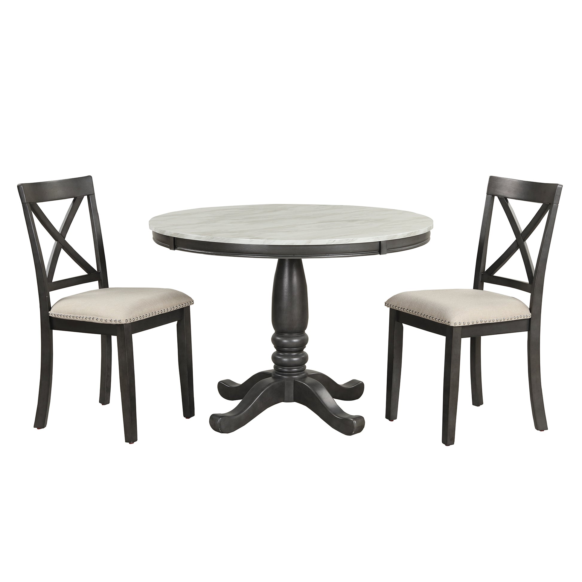 Round marble top dining table with dark wood pedestal base and two upholstered chairs