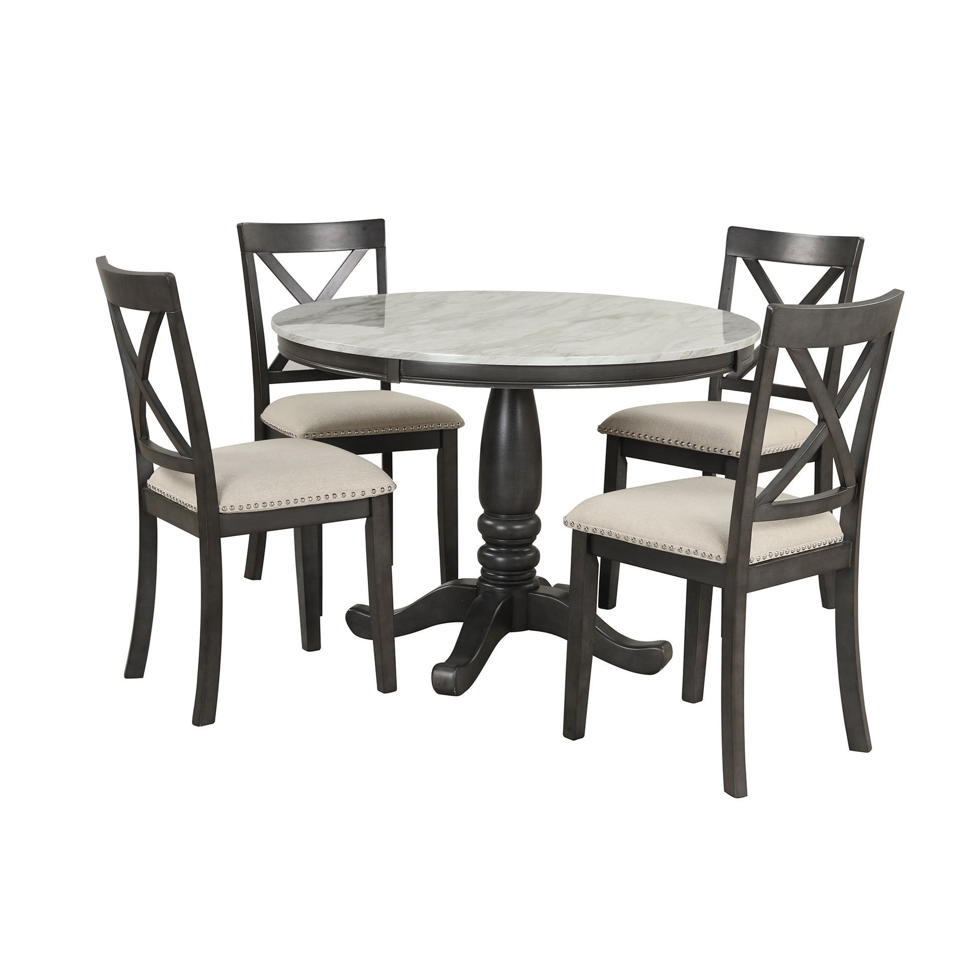 Round marble top dining table with four dark gray chairs and upholstered seats