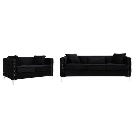 Black velvet chesterfield sofa and loveseat set with chrome legs and decorative nailhead trim