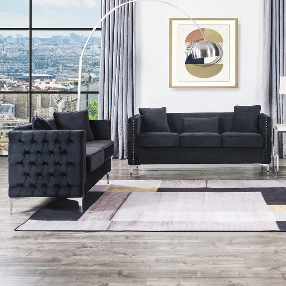 Dark gray velvet tufted armchair with silver legs modern design