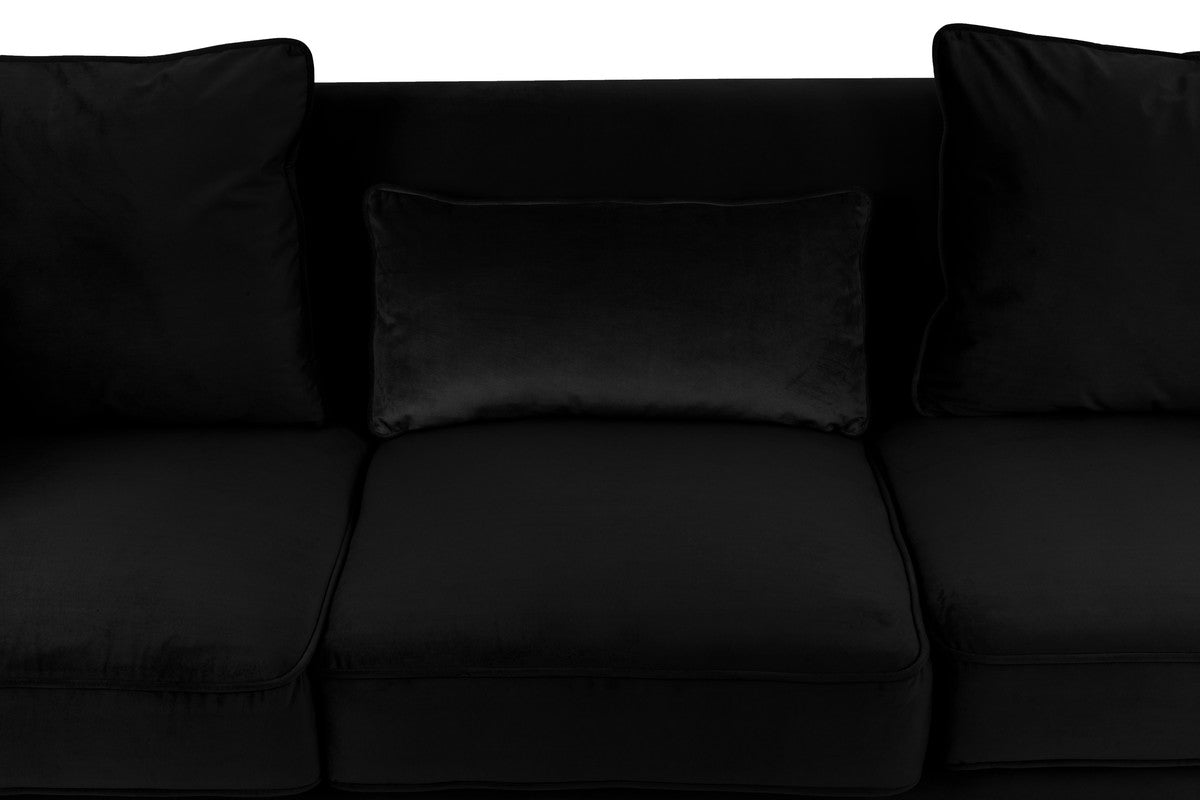Plush black velvet sofa with accent cushions for modern living rooms