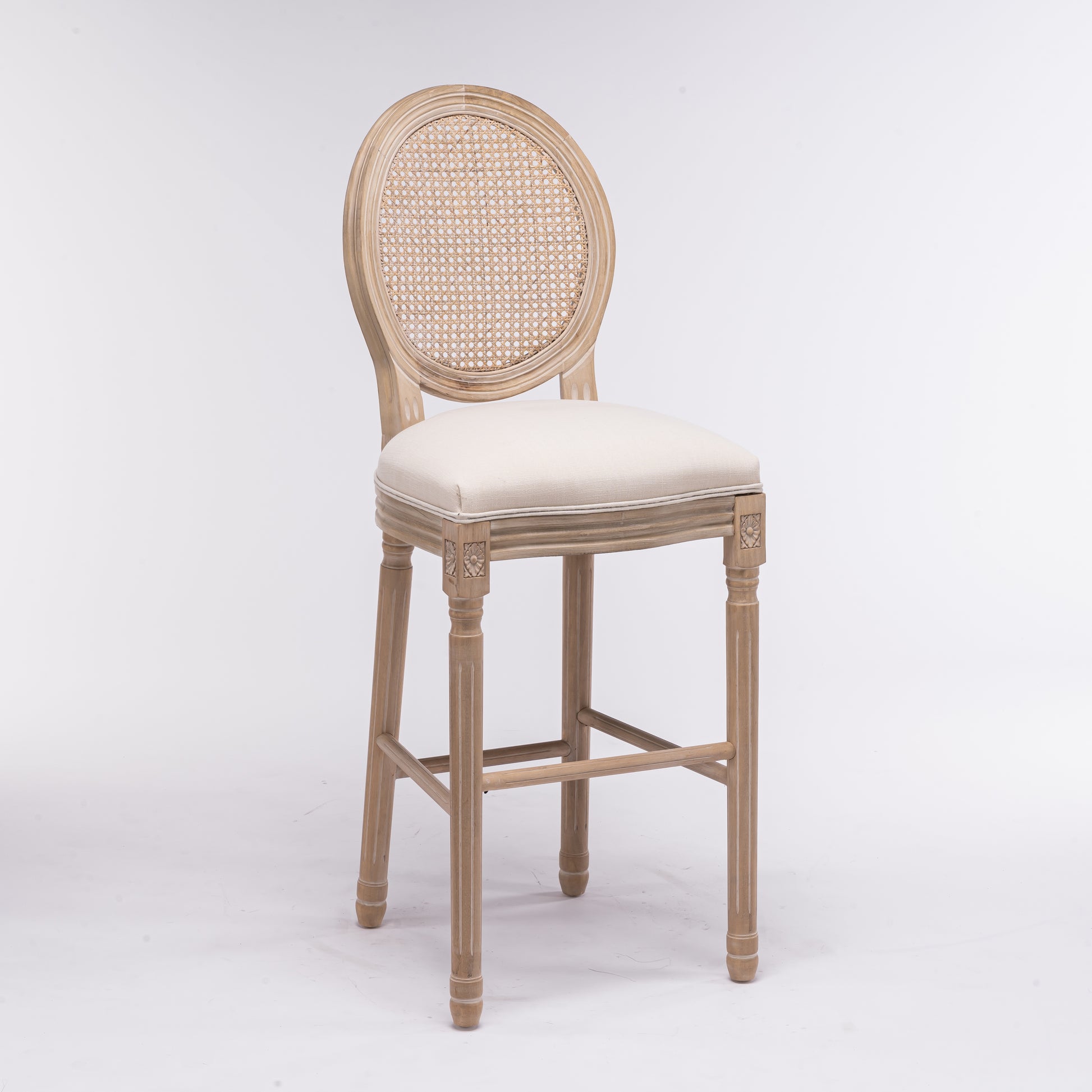 Light oak bar stool with woven cane back and upholstered seat