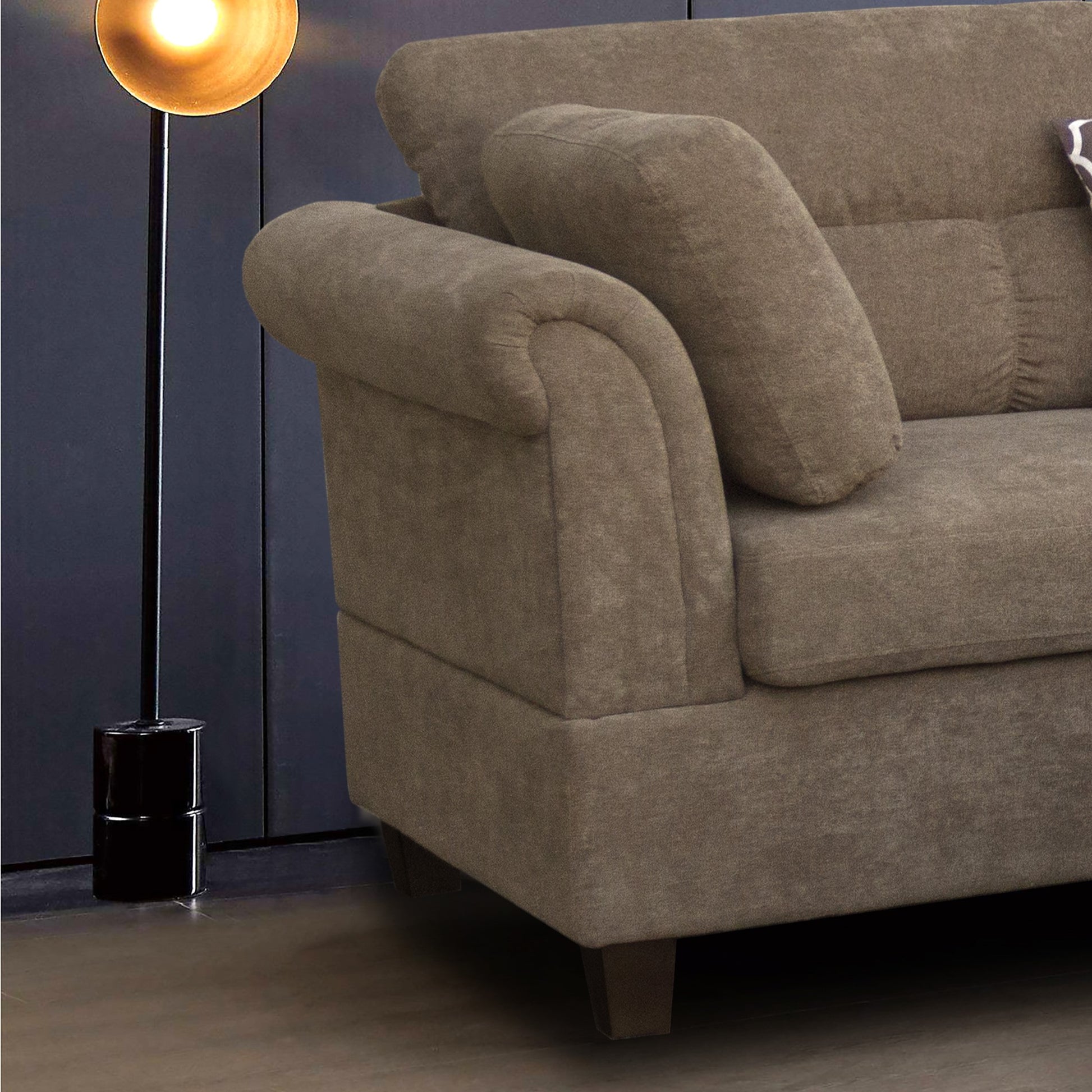 Luxurious taupe fabric sofa with plush cushions and rolled arms perfect for living rooms