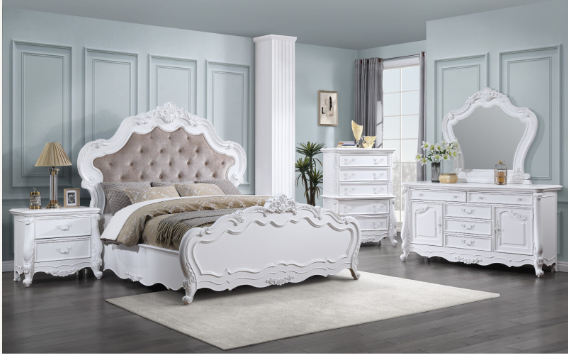 Ornate white upholstered bed frame with tufted headboard and matching nightstand