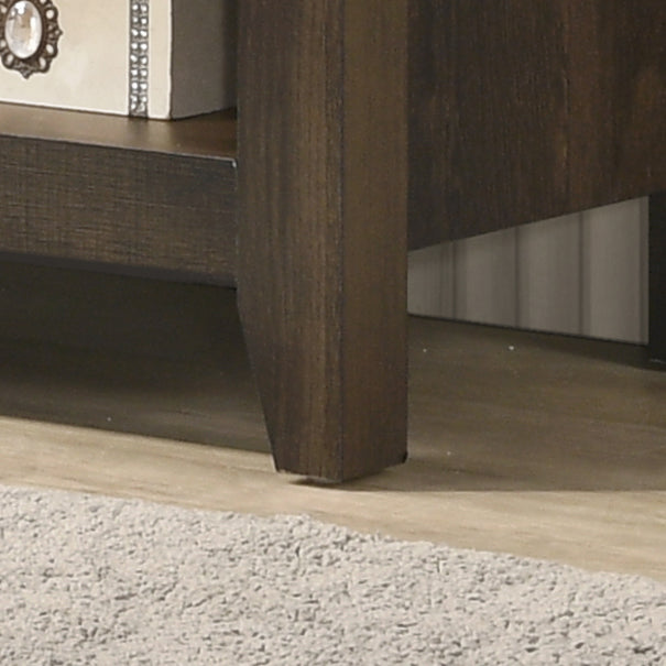Dark wood bed frame with tapered legs and a light rug in foreground