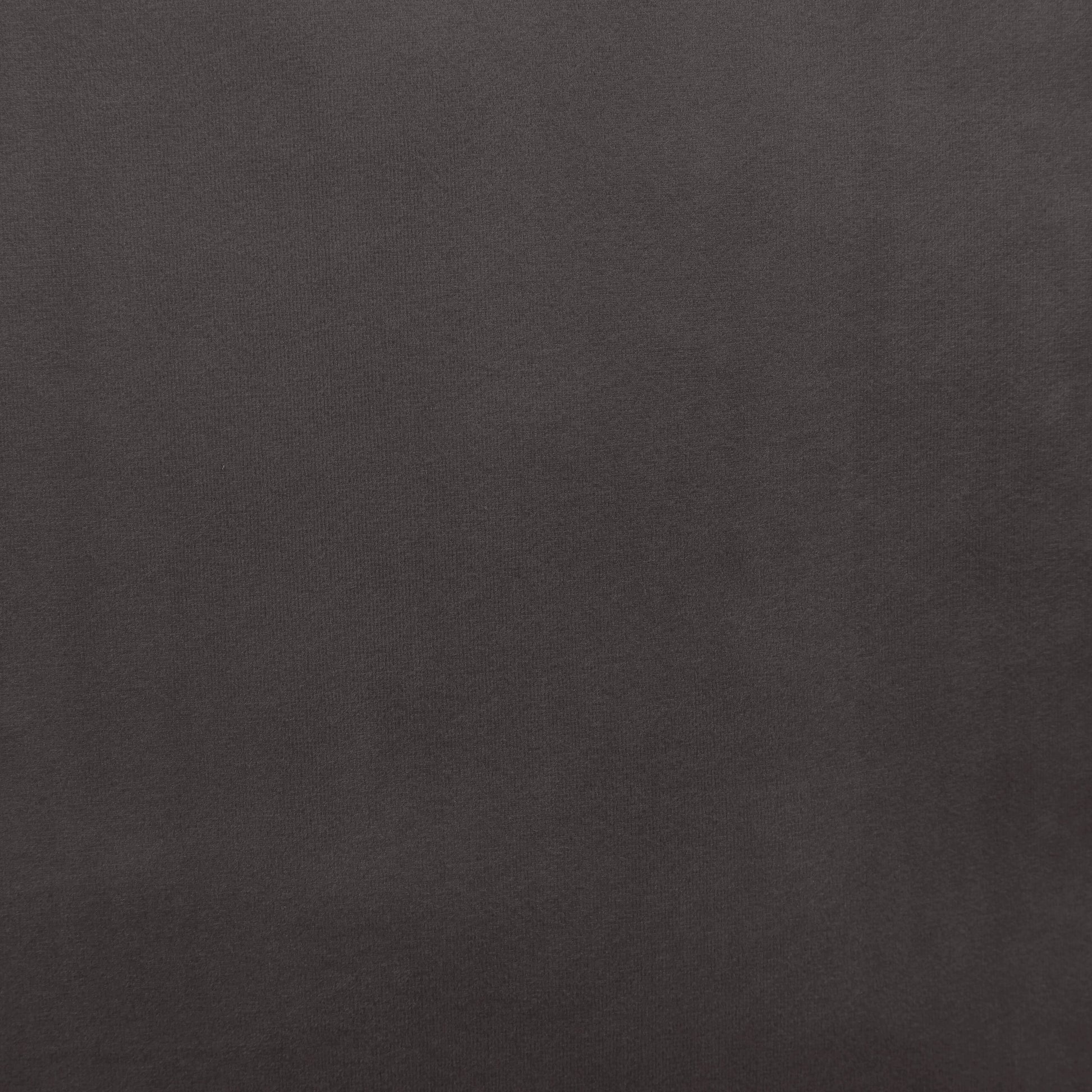 Closeup of dark charcoal gray knit fabric texture perfect for winter sweaters