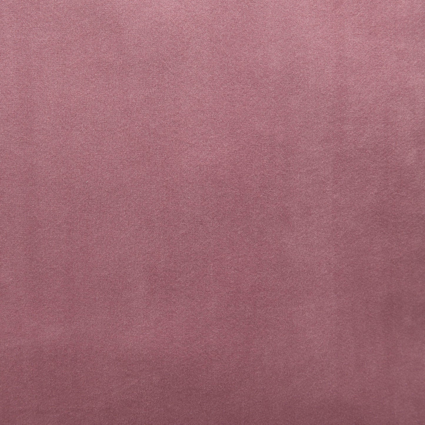 Mauve pink velvet fabric texture with soft nap for upholstery projects