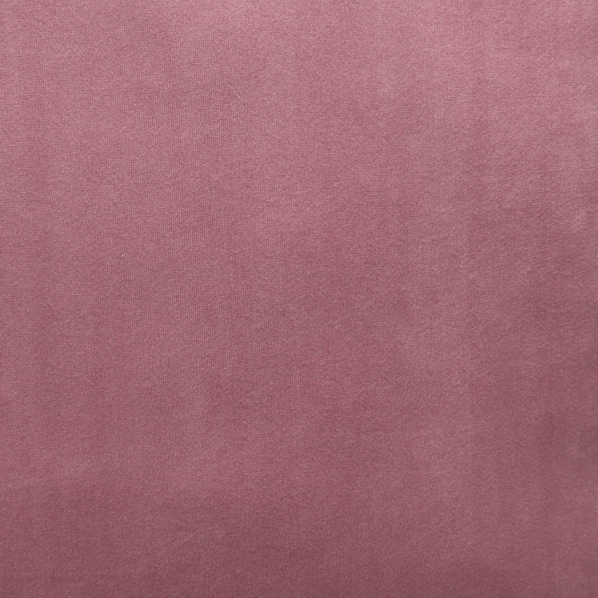 Mauve pink velvet fabric texture with soft nap for upholstery projects