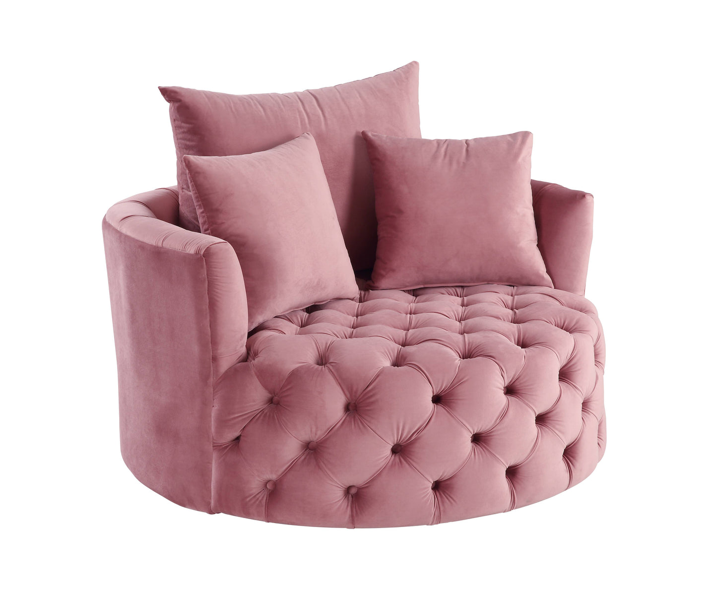 Plush pink velvet accent chair with tufted seat and matching throw pillows