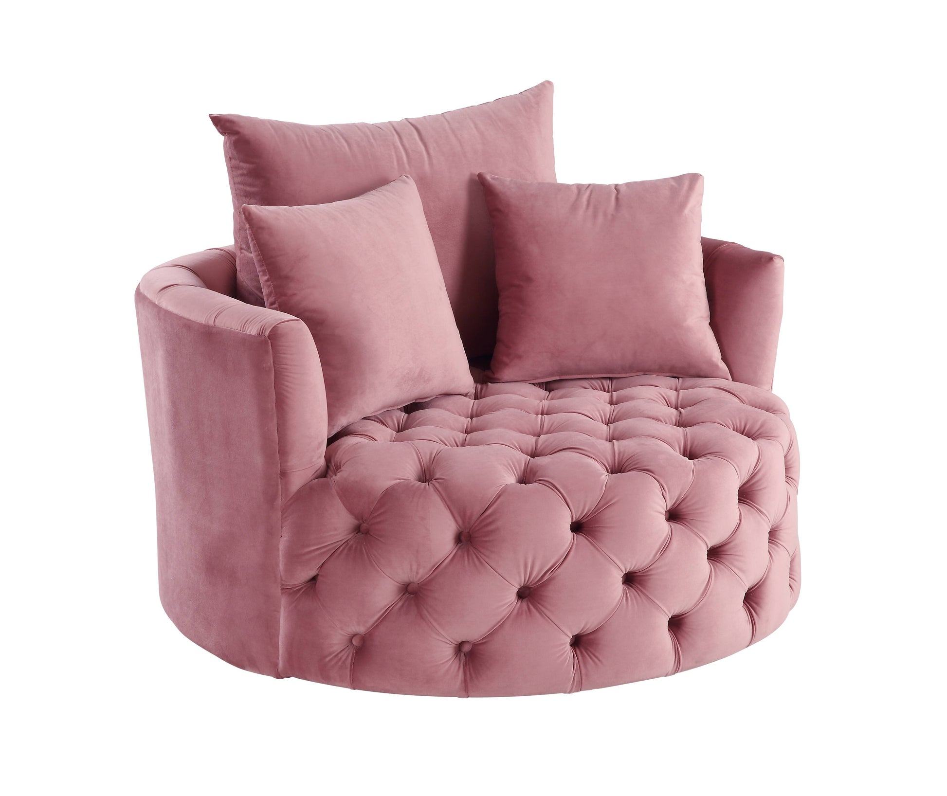 Plush pink velvet accent chair with tufted seat and matching throw pillows
