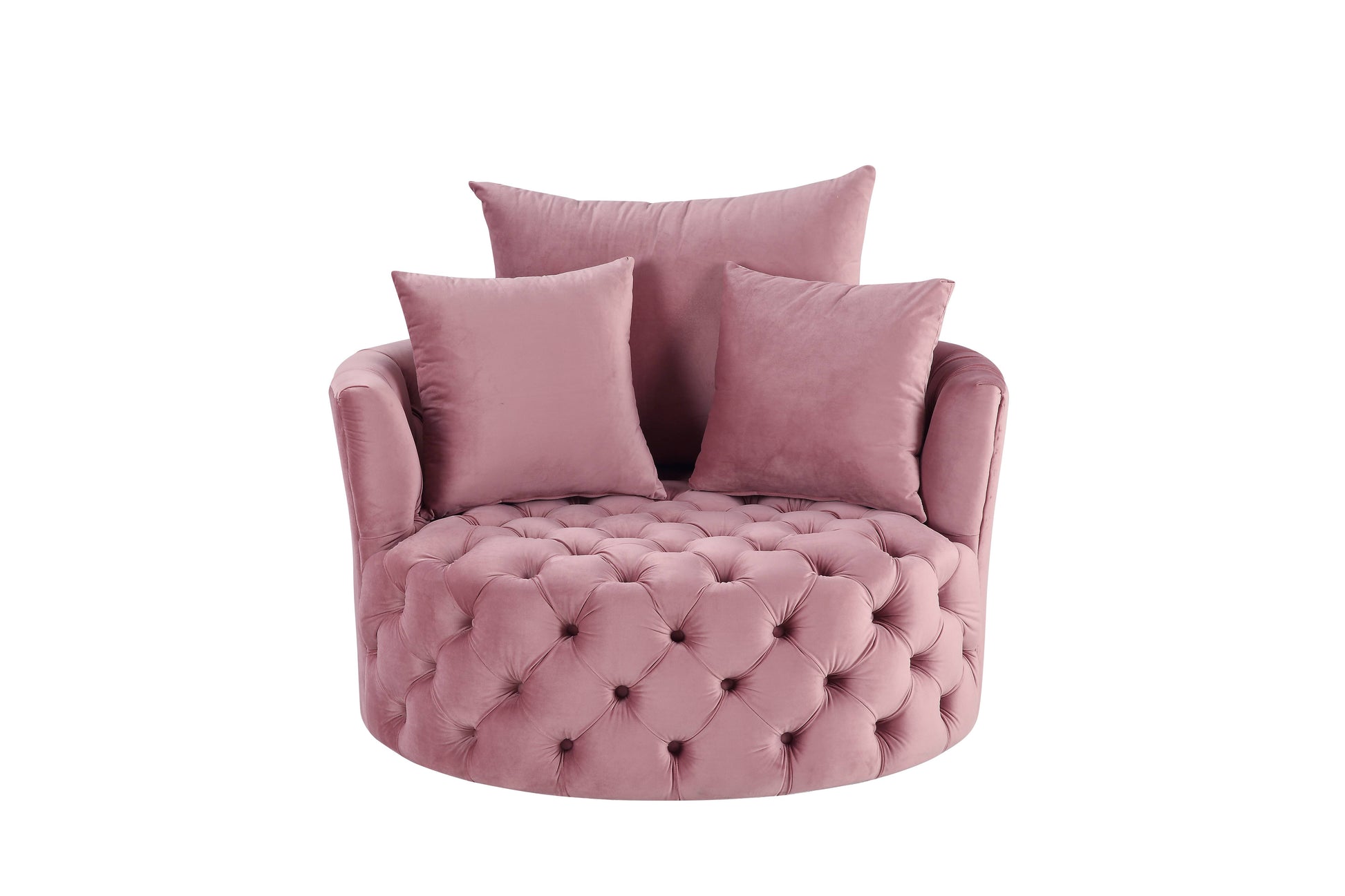 Dusty rose velvet accent chair with tufted detailing and plush throw pillows