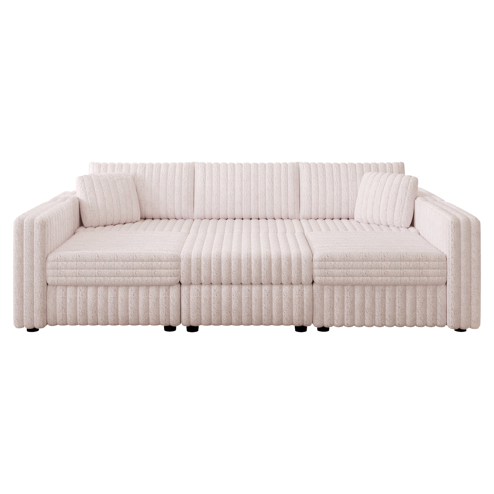 Plush textured cream sofa with three seat cushions and plush bolster pillows