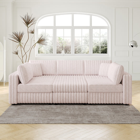 Modern blush pink sofa with textured fabric and plush cushions for a cozy living room