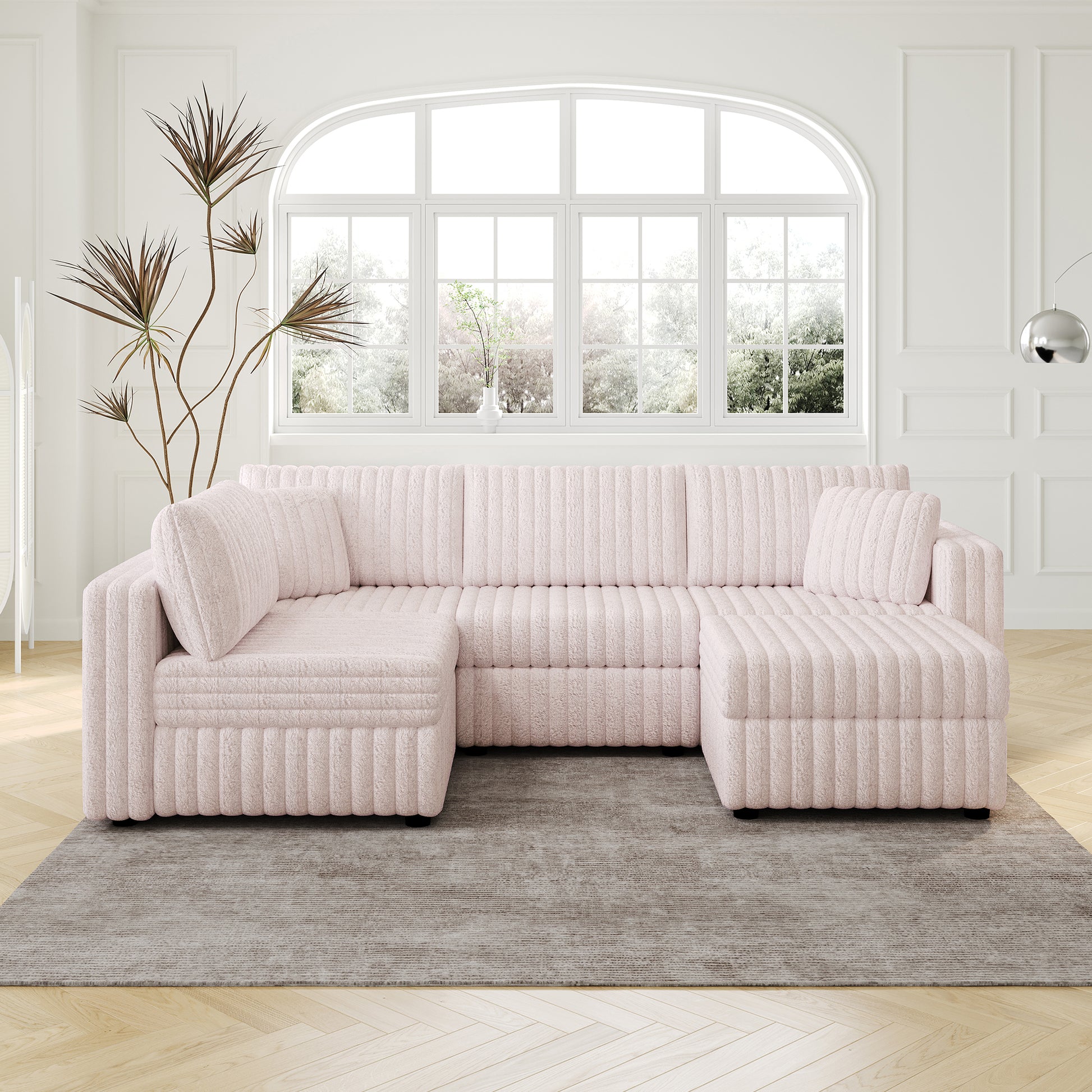 Plush pink sectional sofa with ribbed texture and throw pillows for a cozy living room