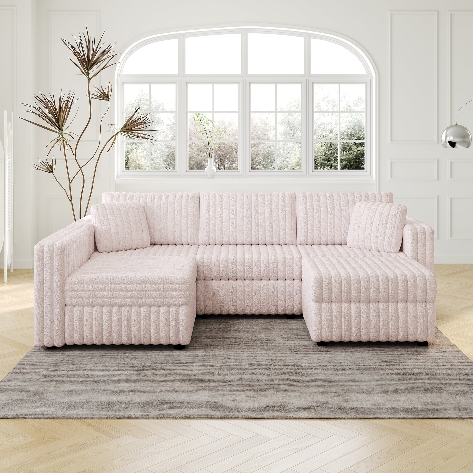 Plush pink sectional sofa with textured upholstery and matching throw pillows