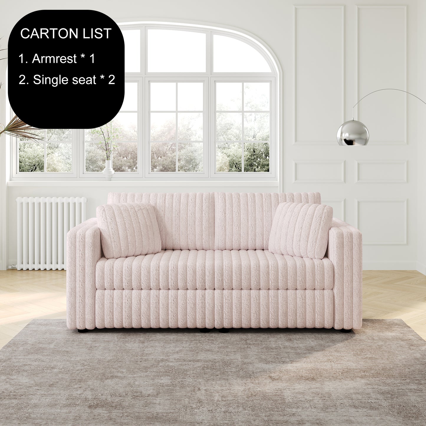 Pink ribbed sofa with plush cushions in a bright modern living room