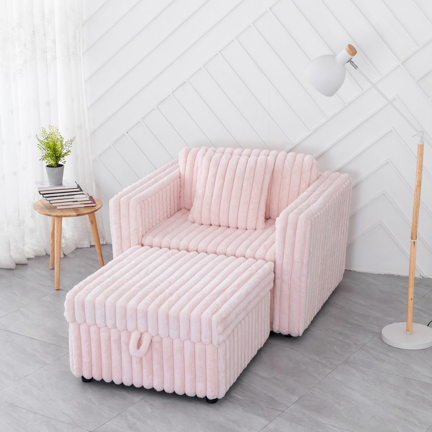 Plush pink velvet armchair with matching ottoman and ribbed texture for a cozy feel