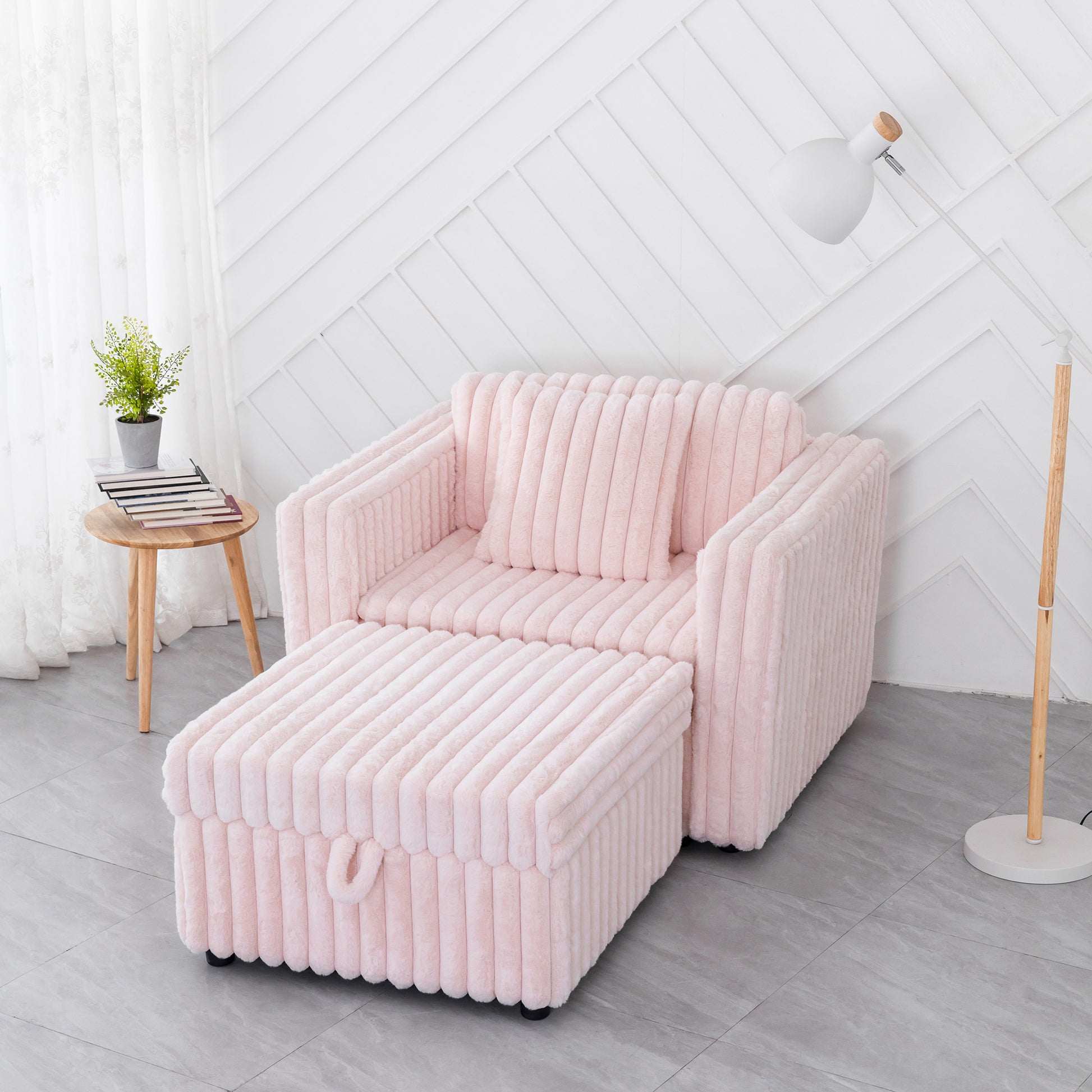 Plush pink velvet armchair with matching ottoman and ribbed texture for a cozy feel