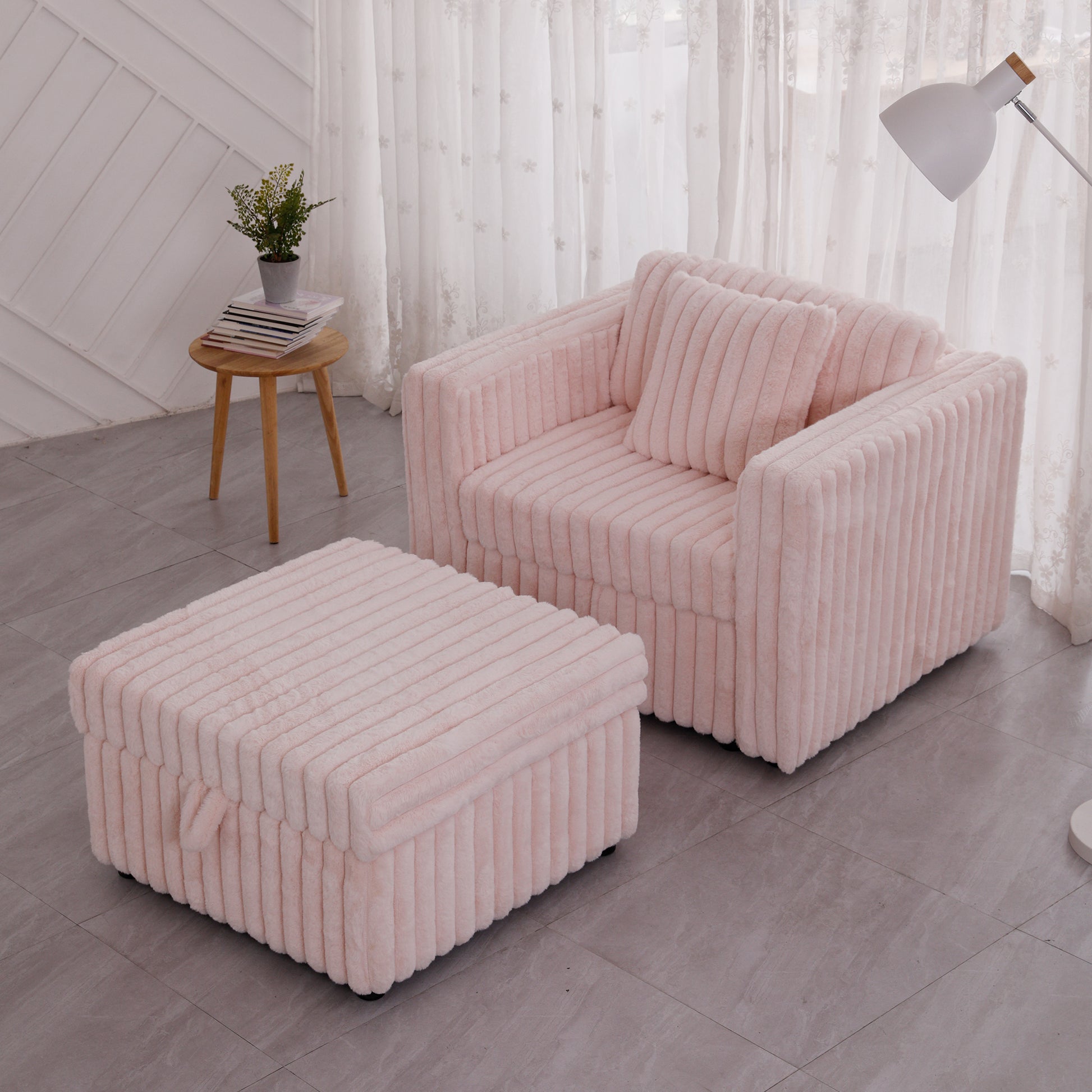 Plush pink corduroy armchair with matching ottoman for cozy living room seating