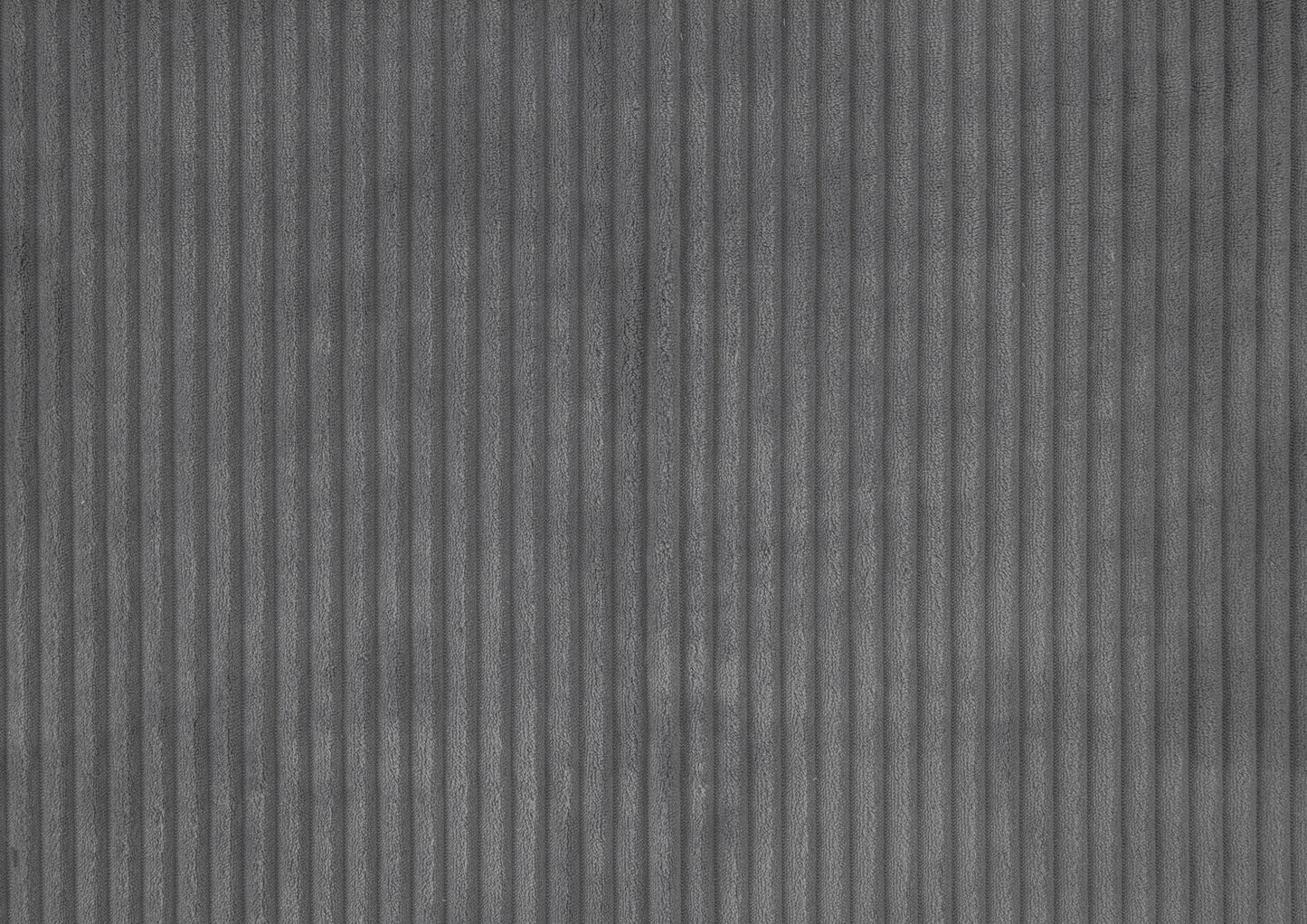Closeup of gray corduroy fabric texture with vertical ribs perfect for upholstery