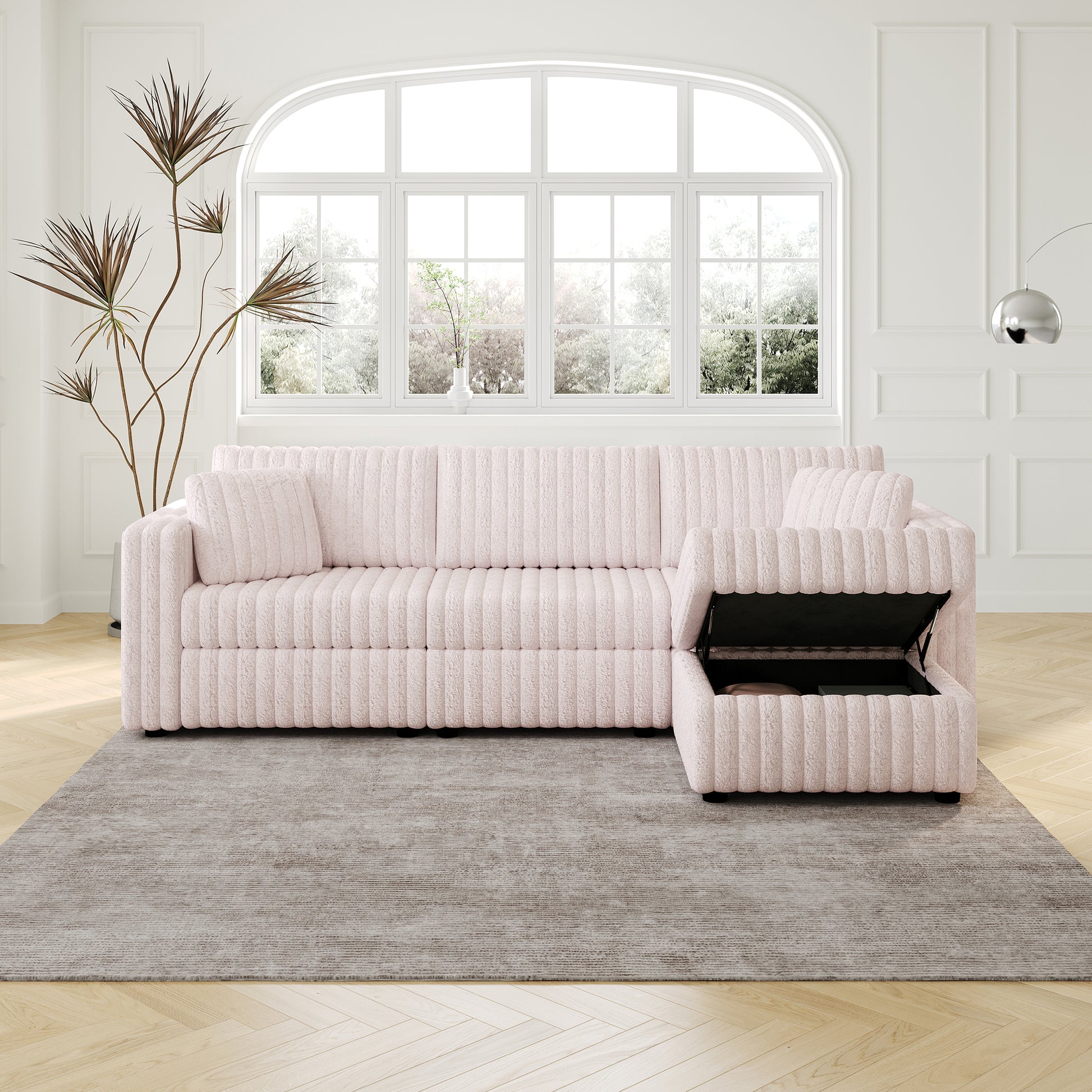 Soft pink ribbed sectional sofa with storage ottoman and plush cushions