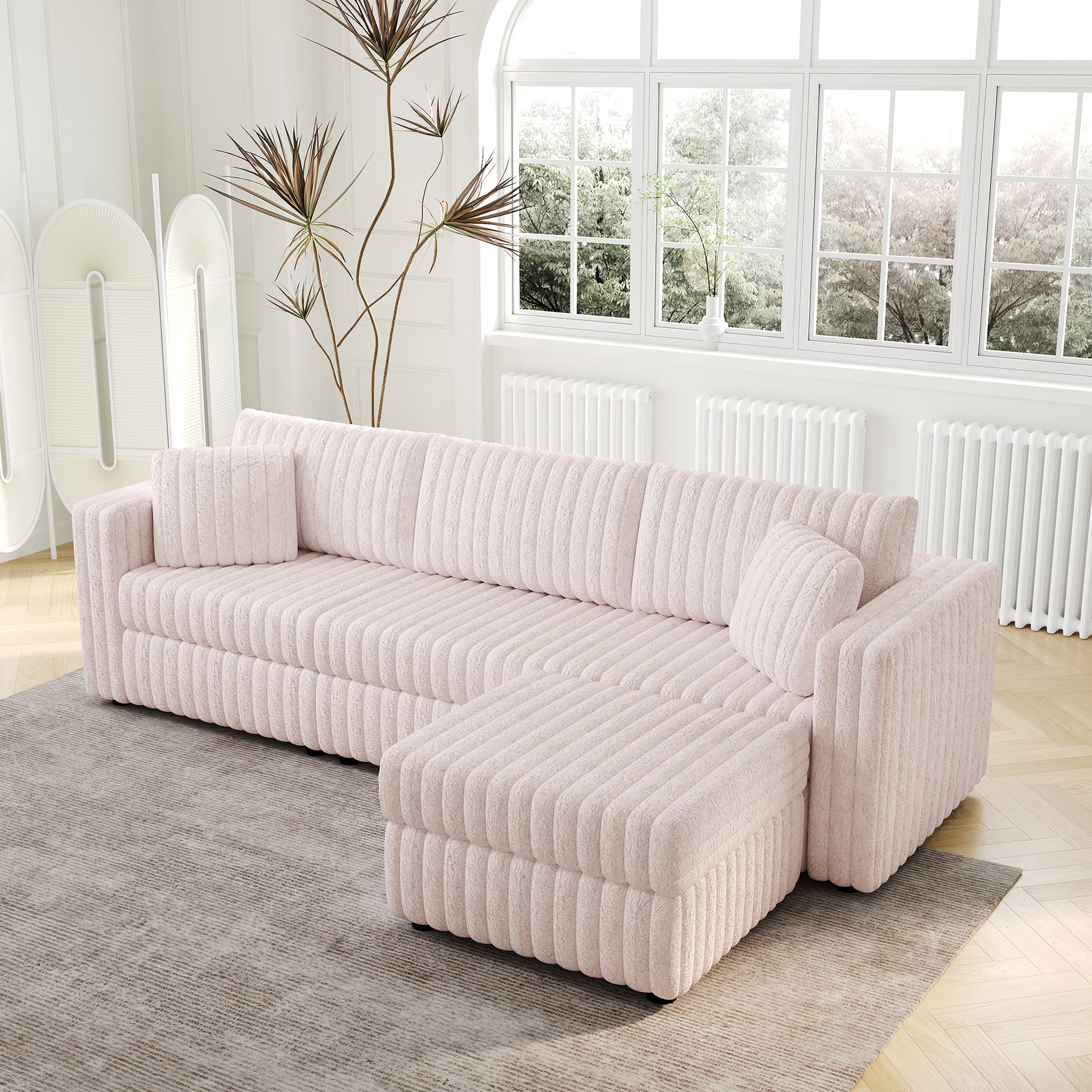 Plush pink sectional sofa with vertical ribbing perfect for modern living rooms
