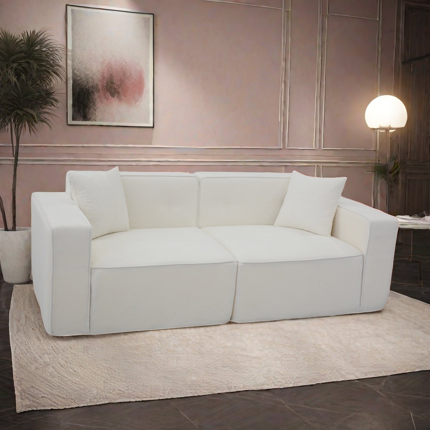 Comfortable offwhite fabric sectional sofa with tufted cushions and minimalist design