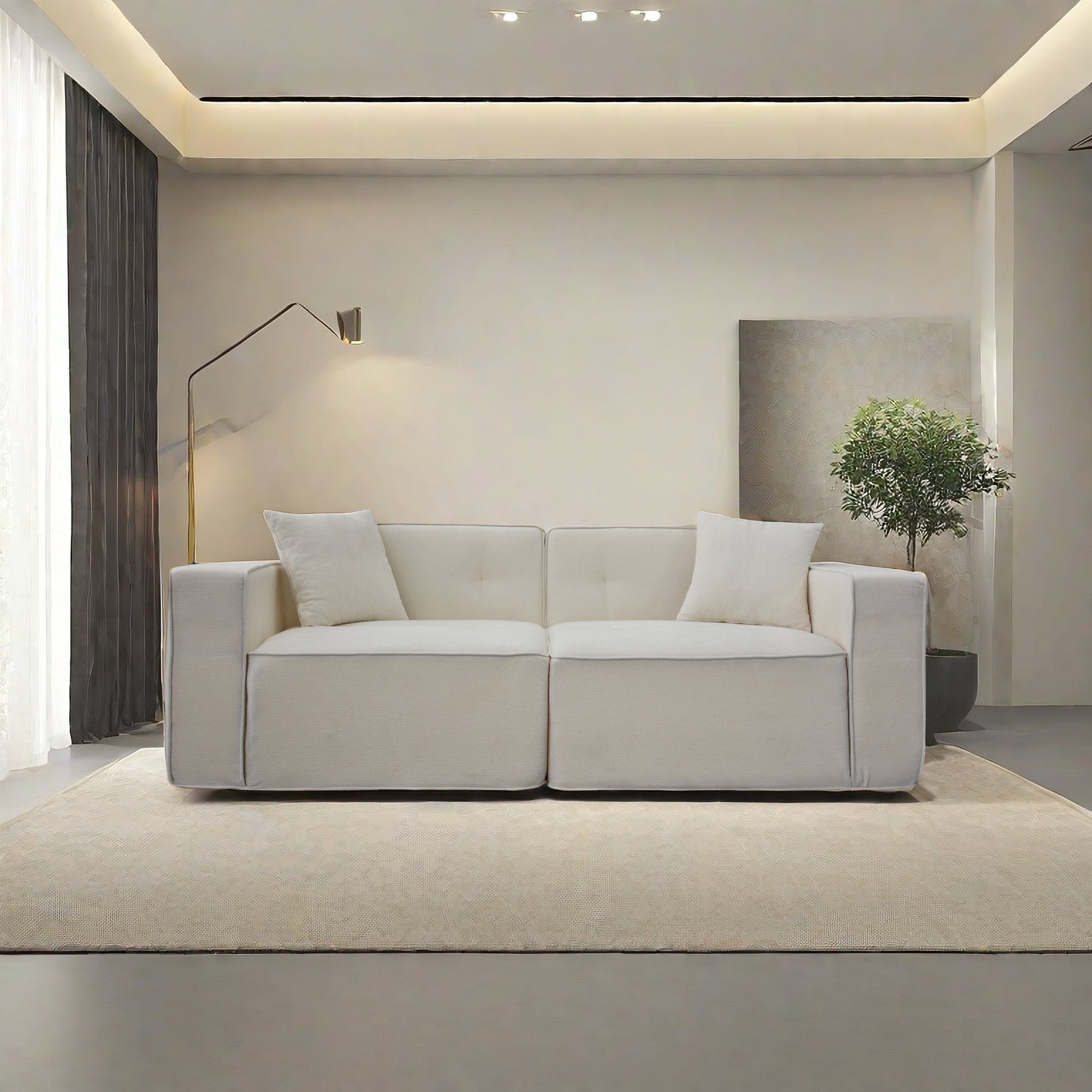 Plush beige sectional sofa with two matching throw pillows perfect for modern living rooms