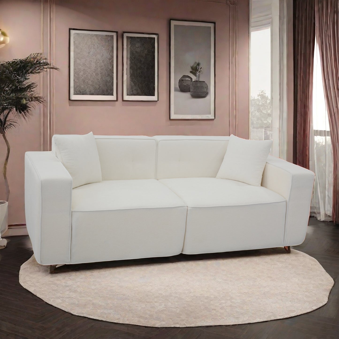 Elegant white fabric sofa with plush cushions and modern design