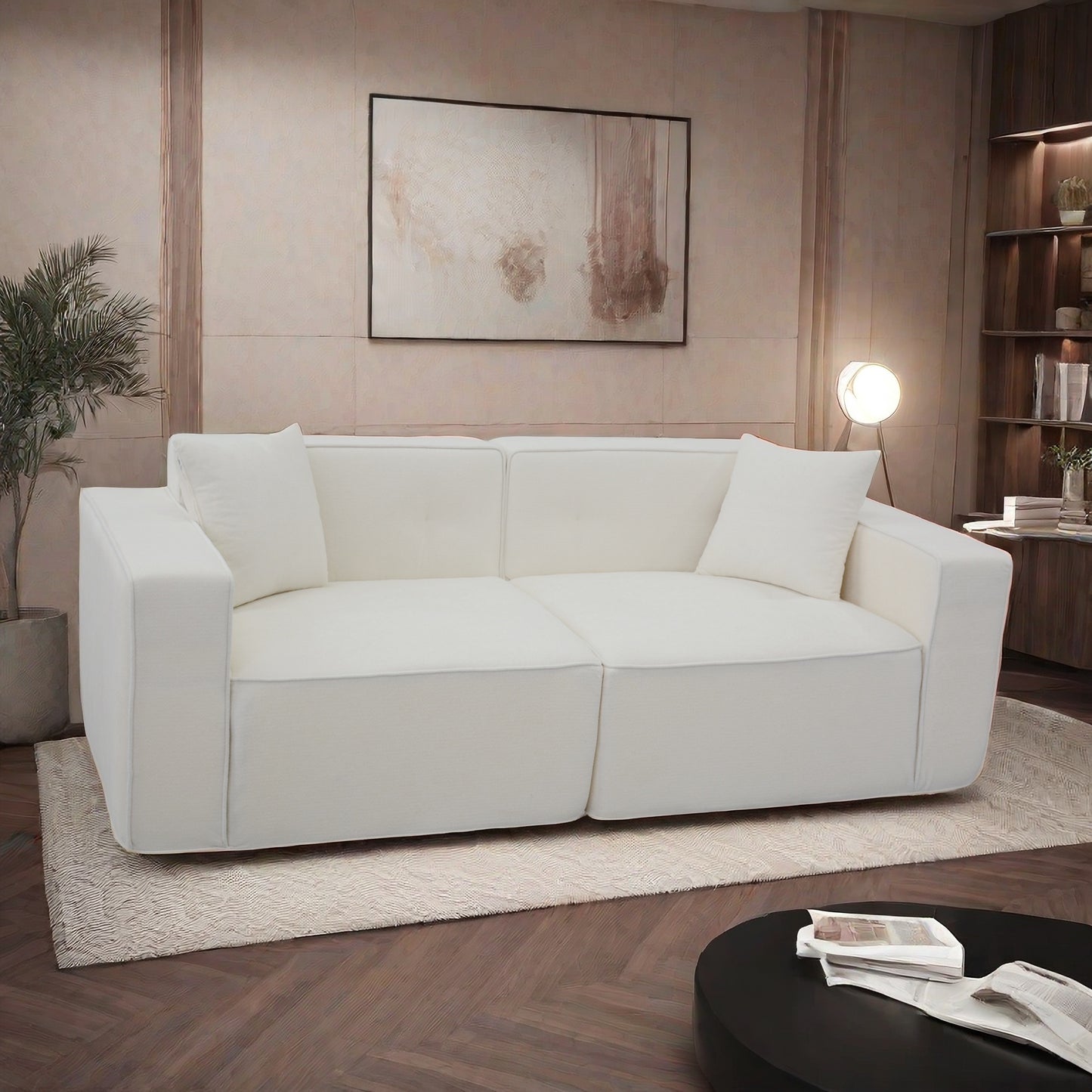Plush white sectional sofa with textured fabric and two accent pillows perfect for a modern living room