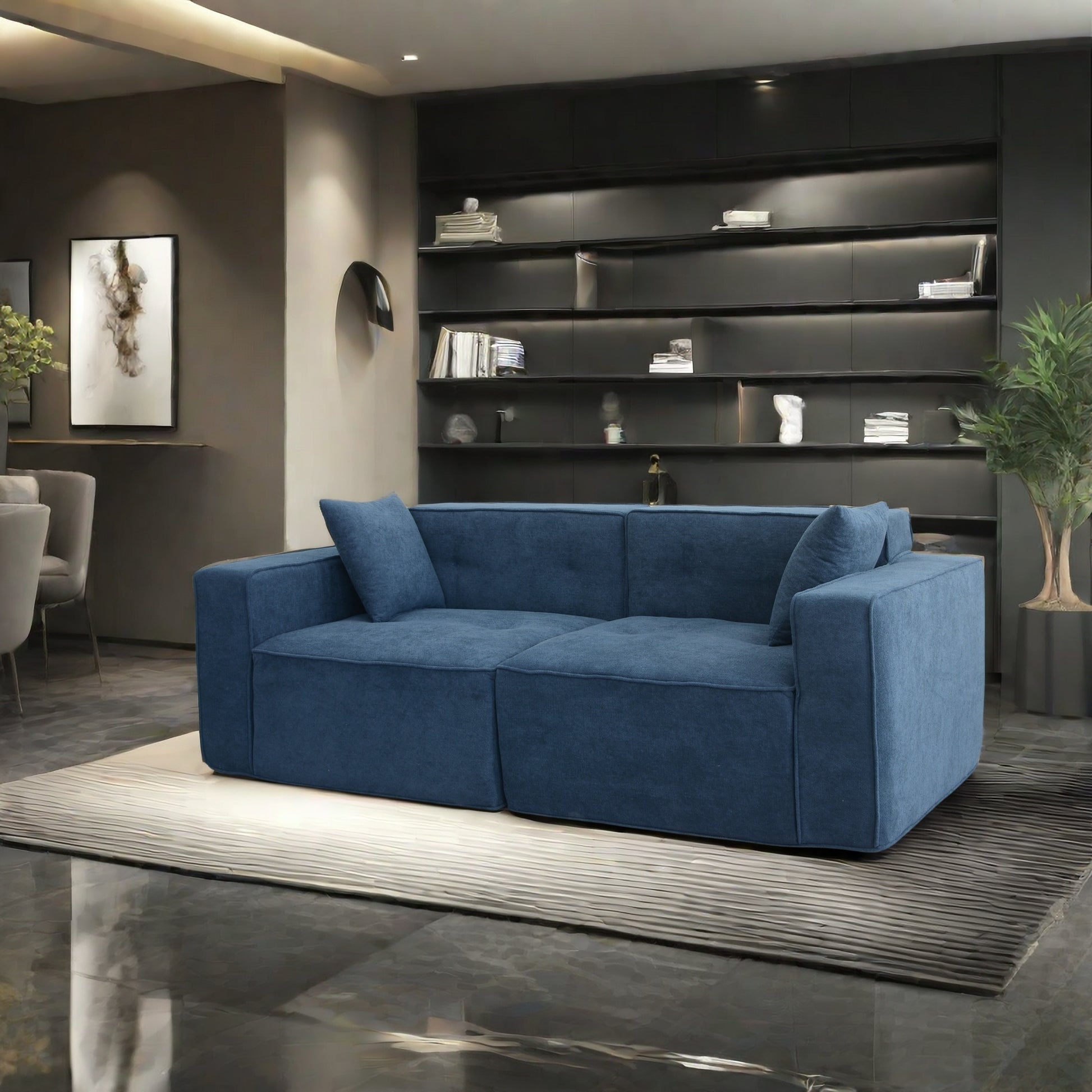 Deep blue fabric sectional sofa with square arms and plush cushions
