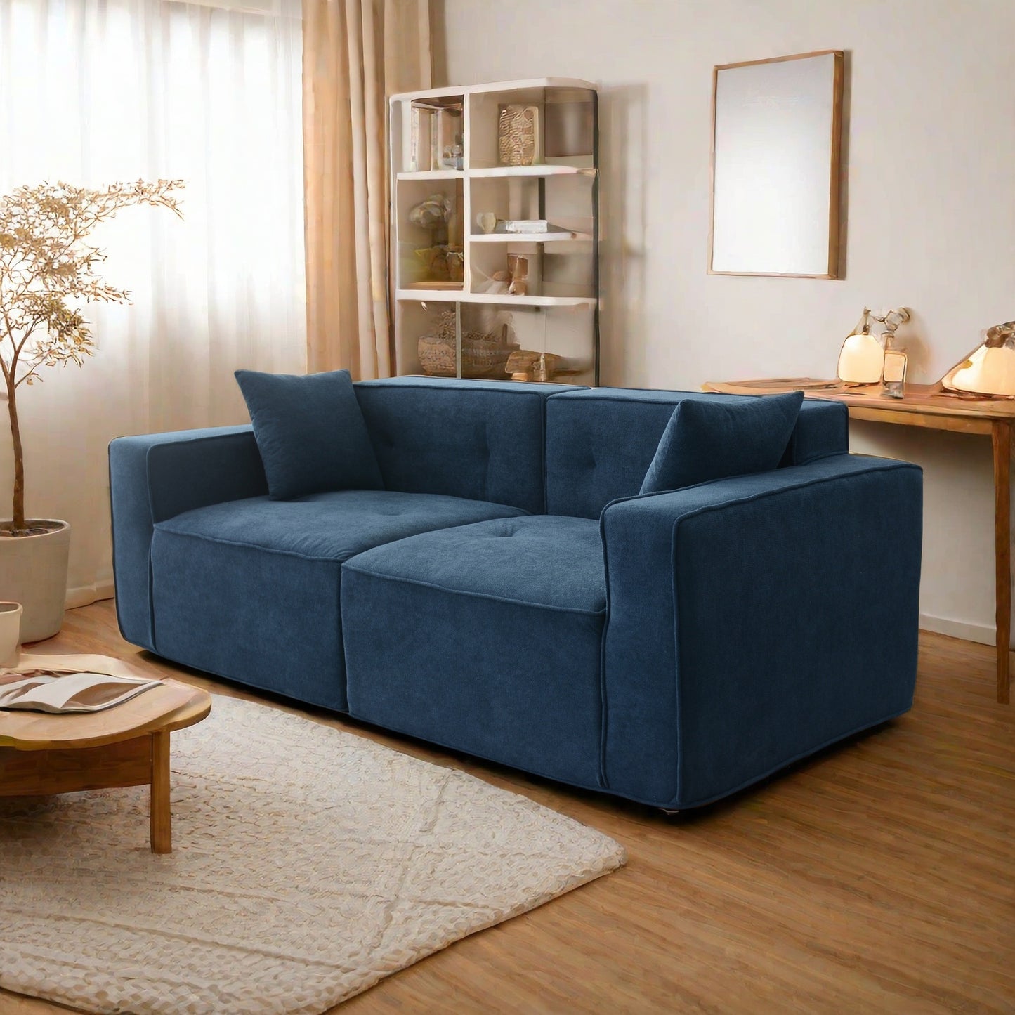 Deep blue modern fabric sectional sofa with plush cushions and elegant tufting for living rooms