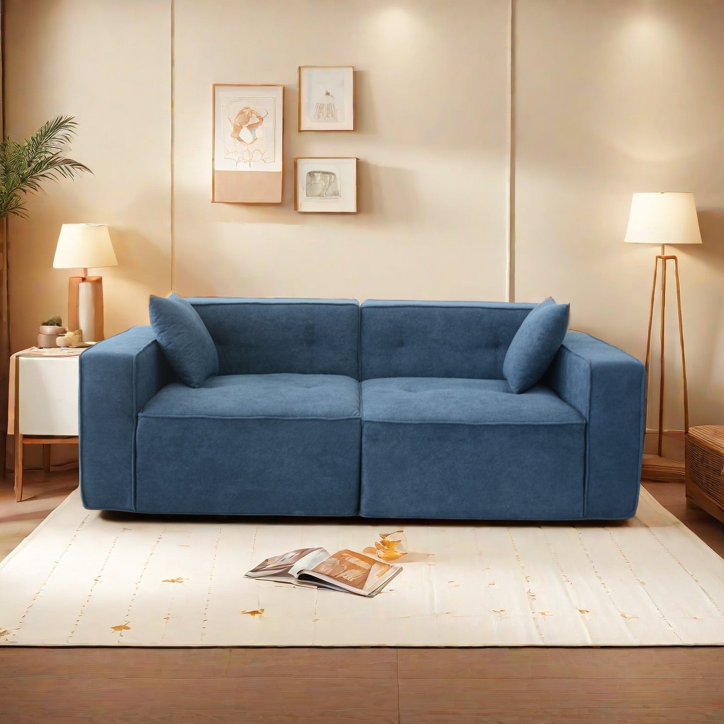 Modular deep blue fabric sectional sofa with plush cushions and modern design