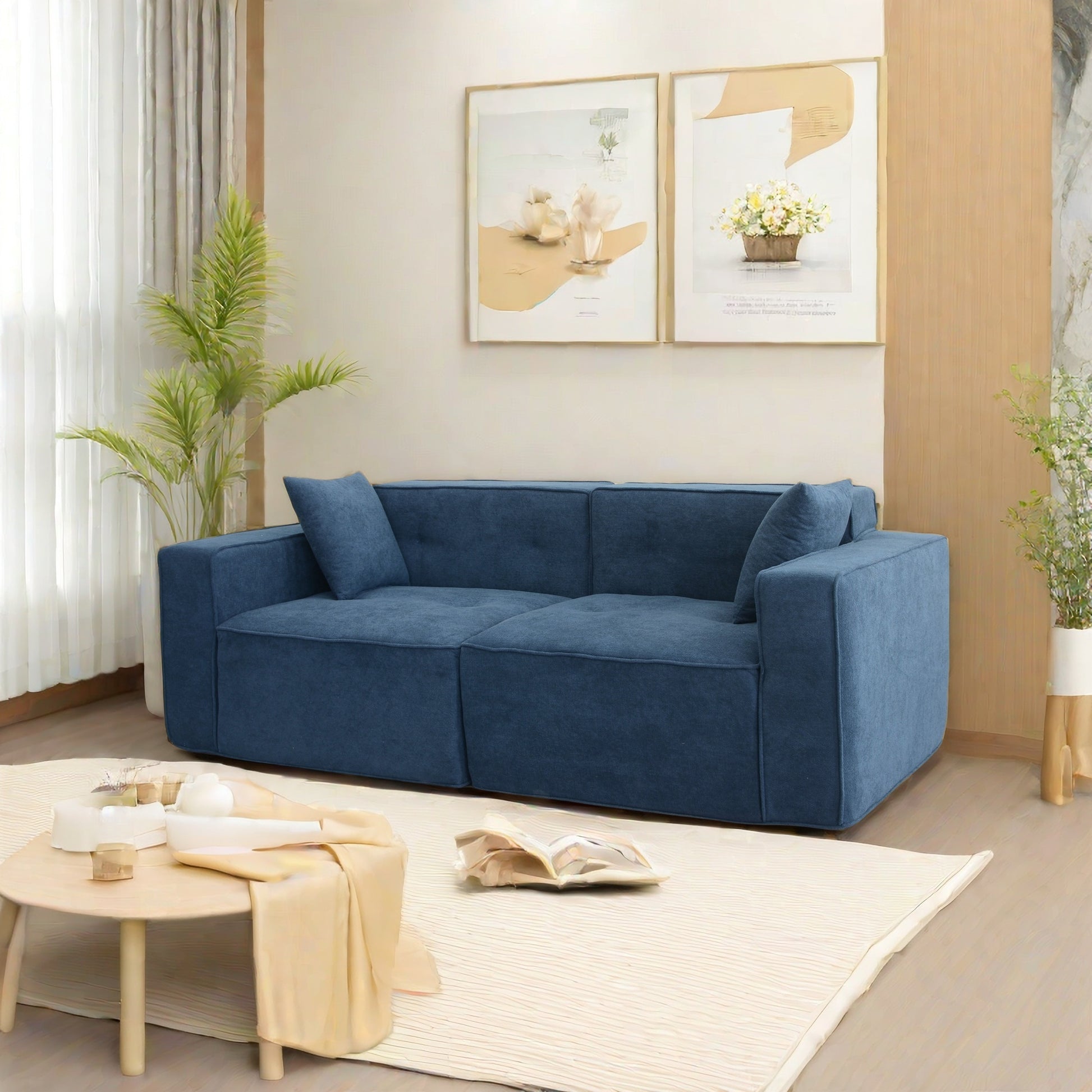 Deep blue upholstered modular sofa with plush cushions perfect for modern living rooms