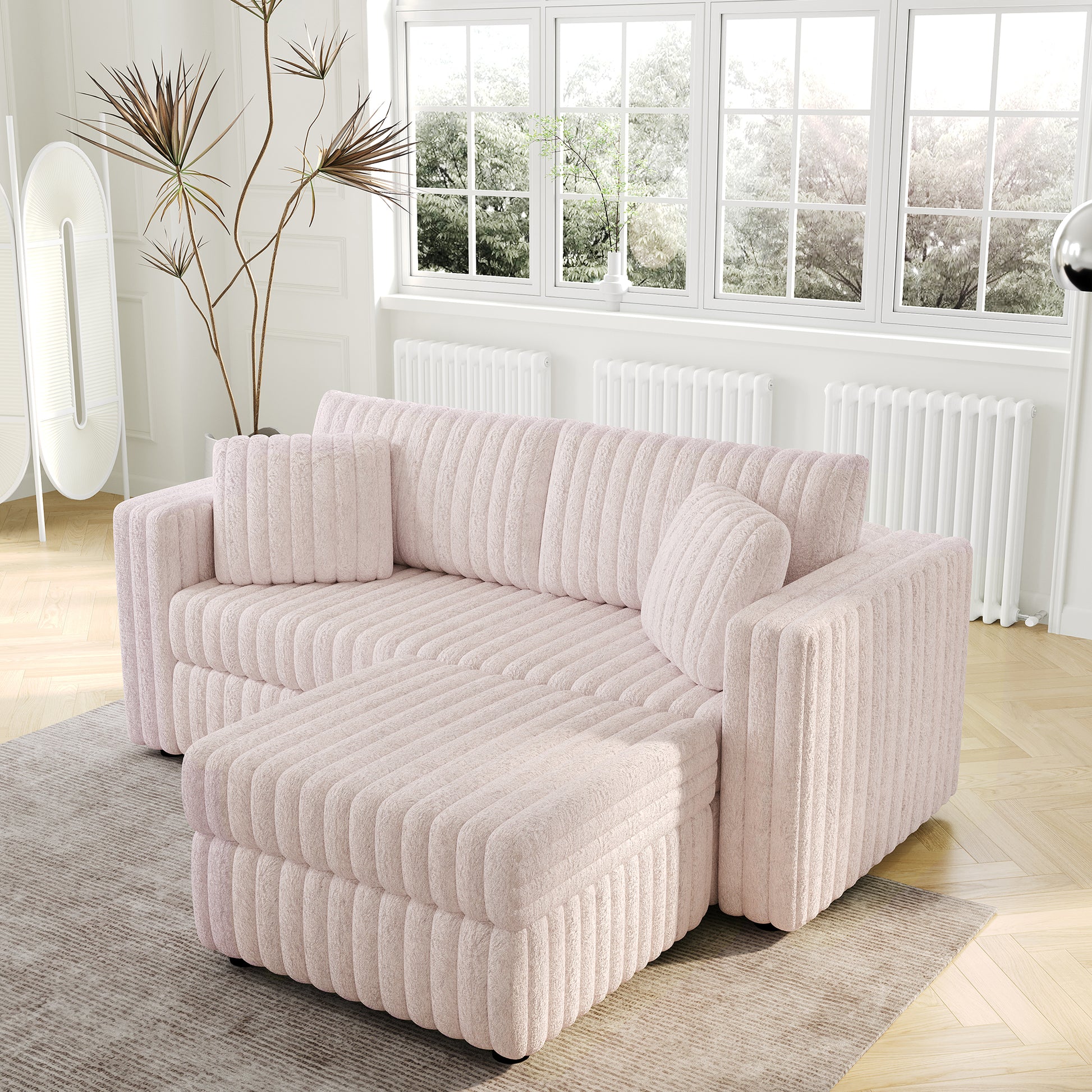 Plush pink sectional sofa with ribbed texture and plush cushions perfect for living room relaxation