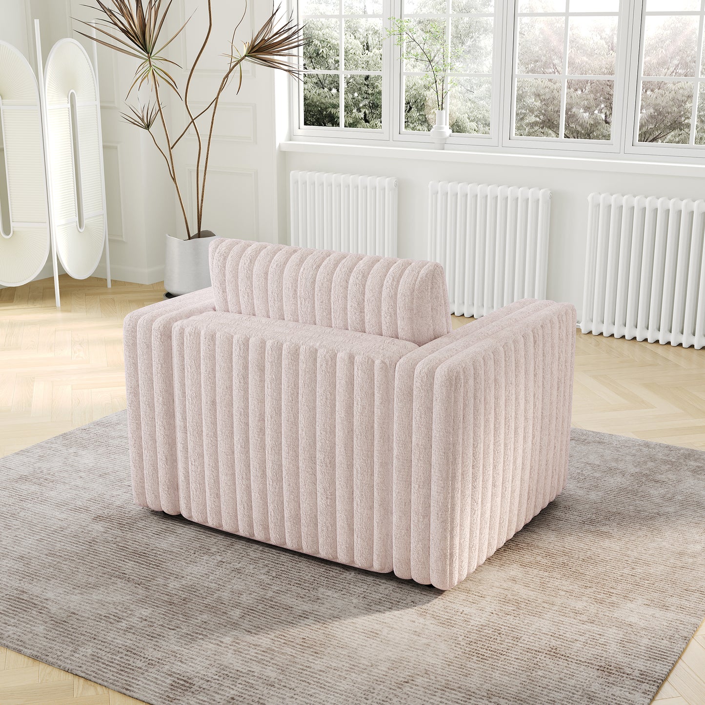Plush pink armchair with vertical channel tufting modern accent seating