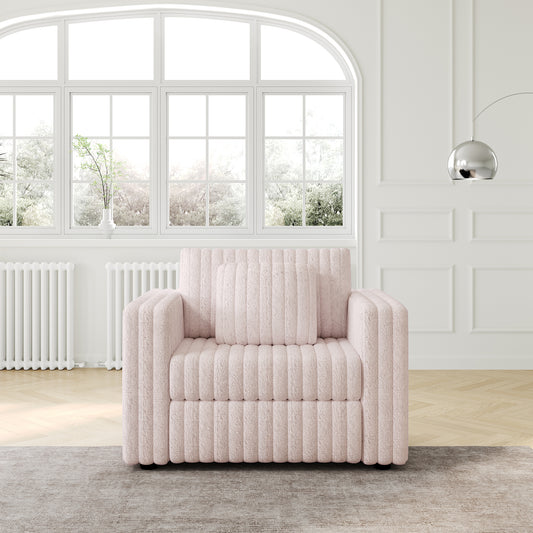 Textured pink boucle armchair with plush cushioning and matching throw pillow