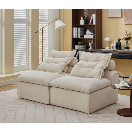 Plush cream corduroy sectional sofa with oversized tufted cushions for ultimate comfort and style