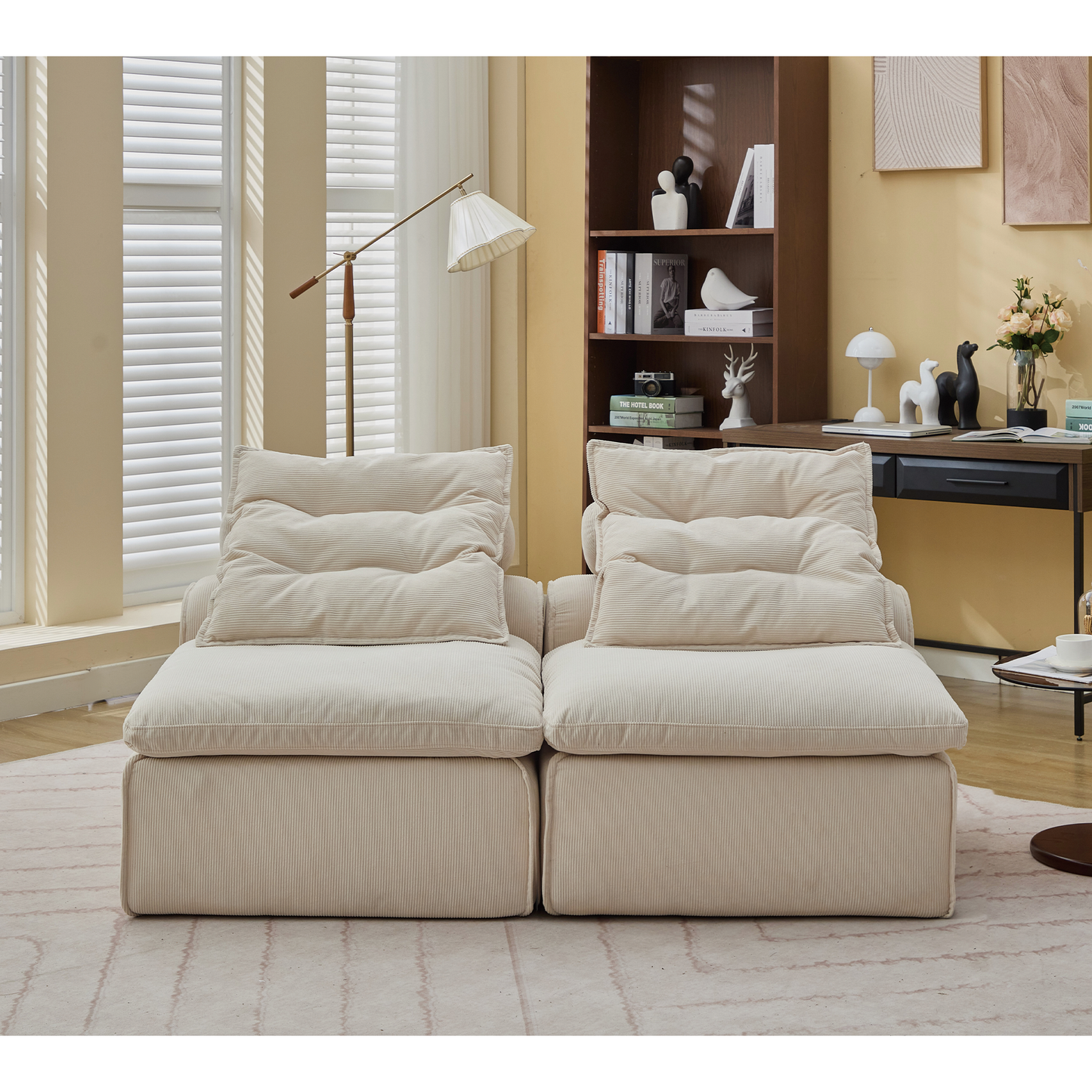Cream corduroy modular sofa with plush seat cushions and pillows ideal for modern living rooms