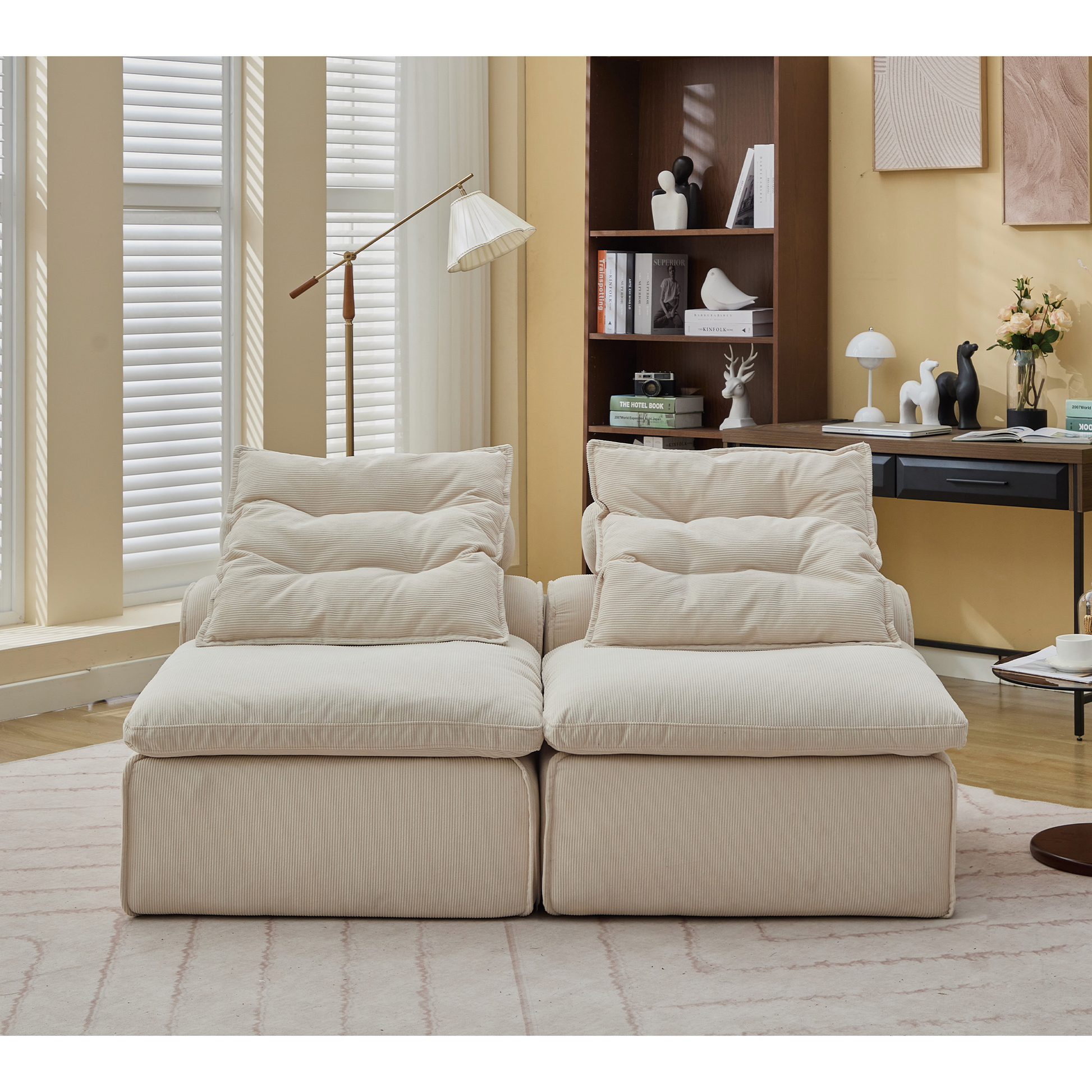 Cream corduroy modular sofa with plush seat cushions and pillows ideal for modern living rooms