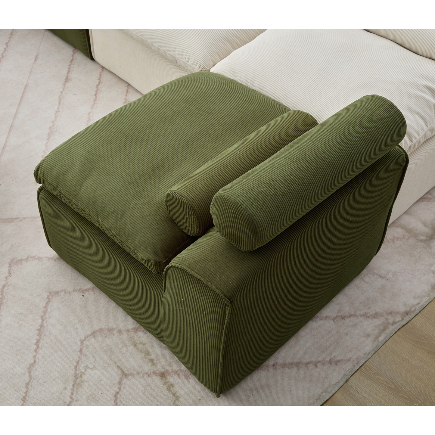 Olive green corduroy modular sofa section with bolster pillows